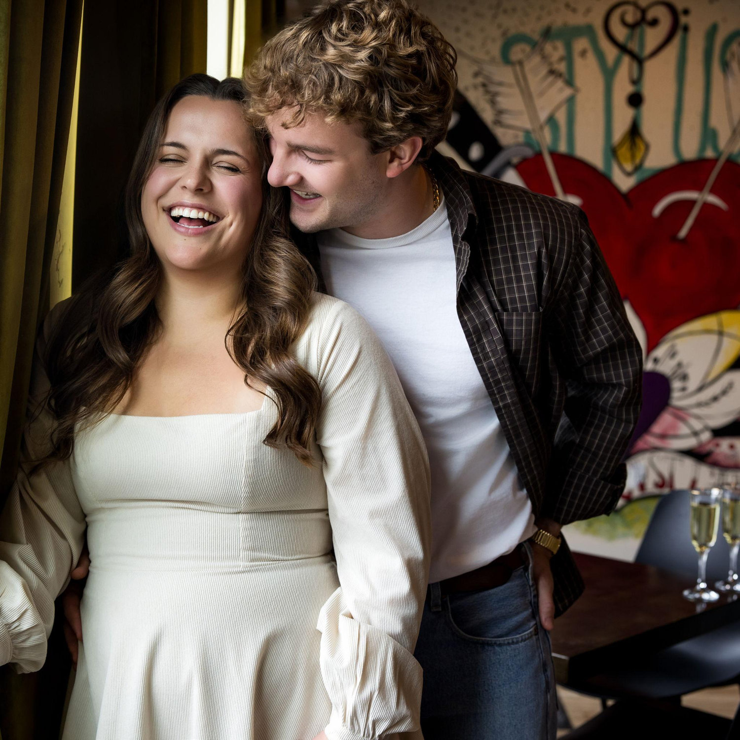 This was taken at one of our favorite local restaurants, Stylus, on our incredible engagement photoshoot with our photographer!