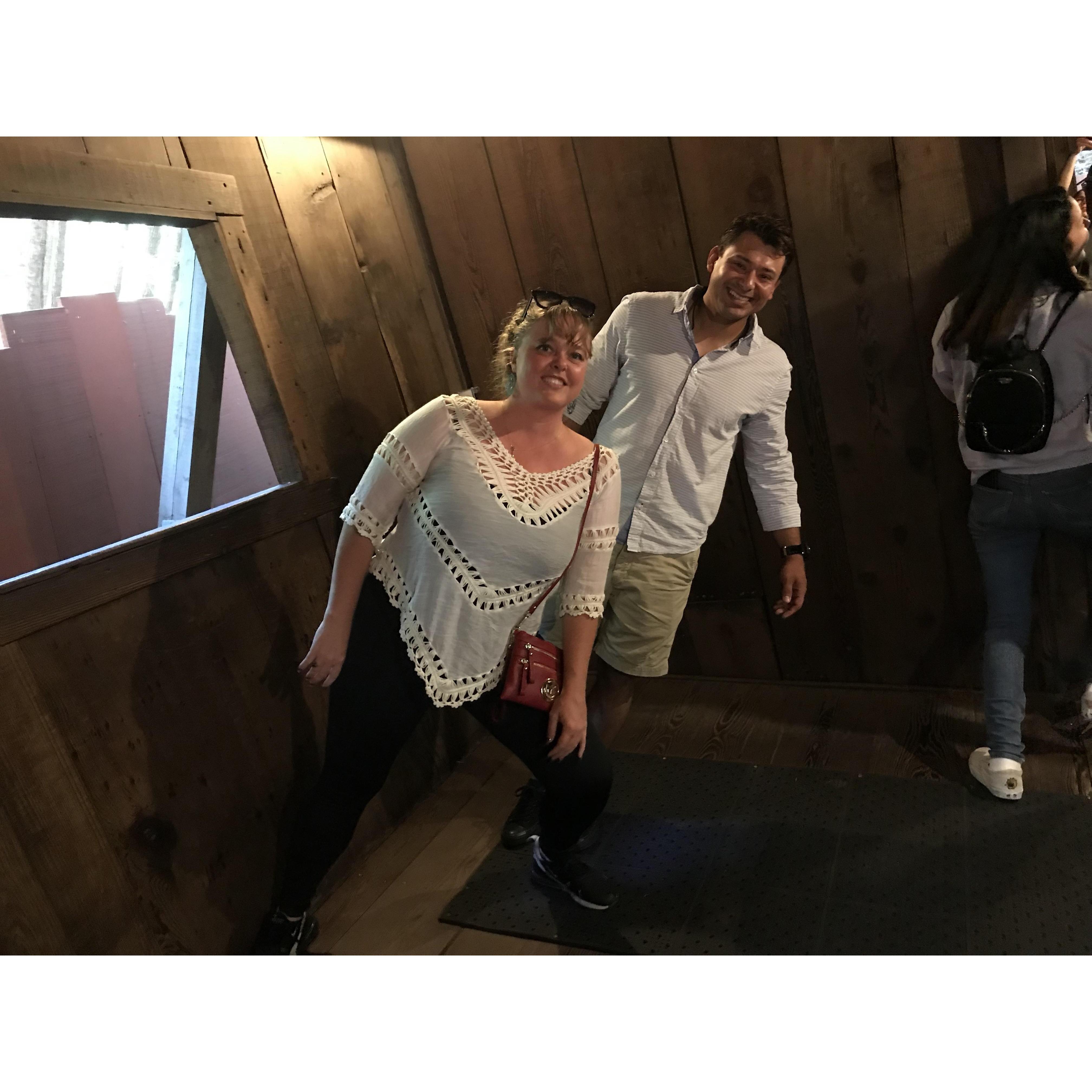 At the Mystery Spot. We enjoy going on adventures together!