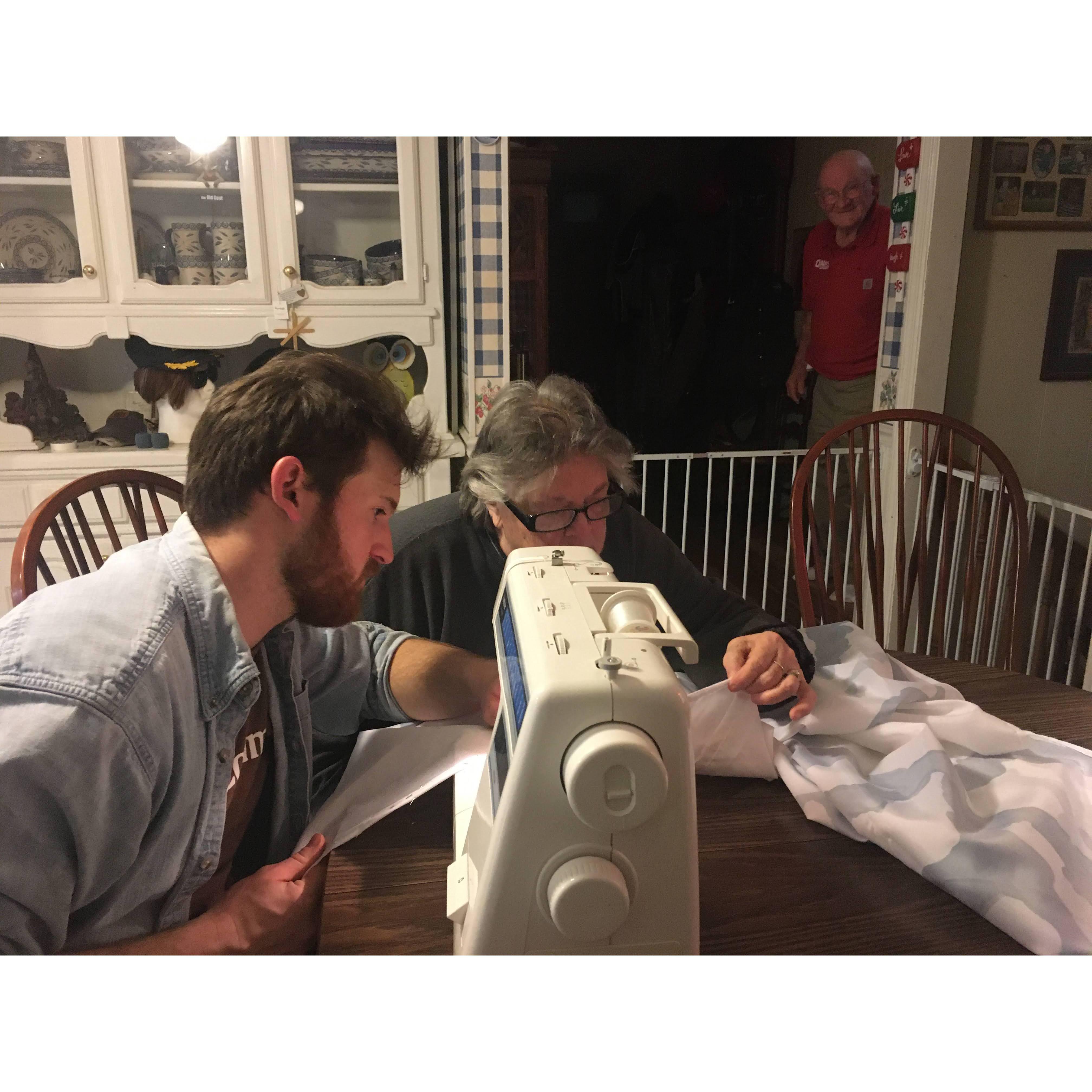 Buck, Barbara and Billy sewing curtains for the motorhome (March 2020)