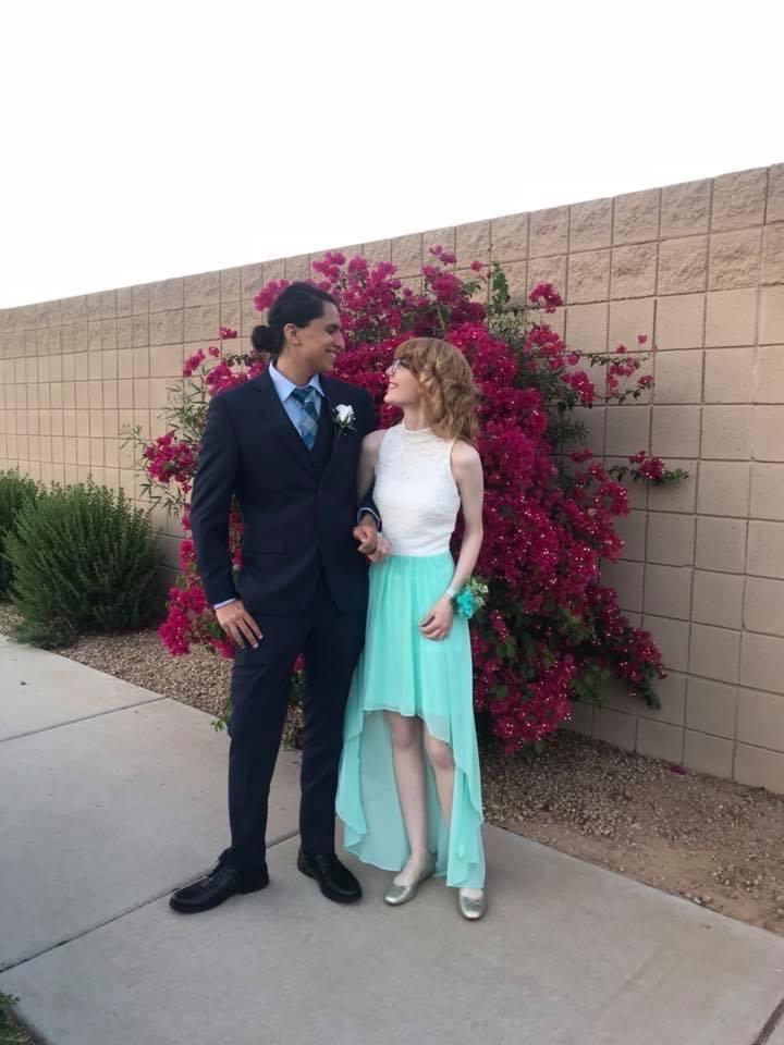 Not even a year in the relationship going to prom! Look how little we were!