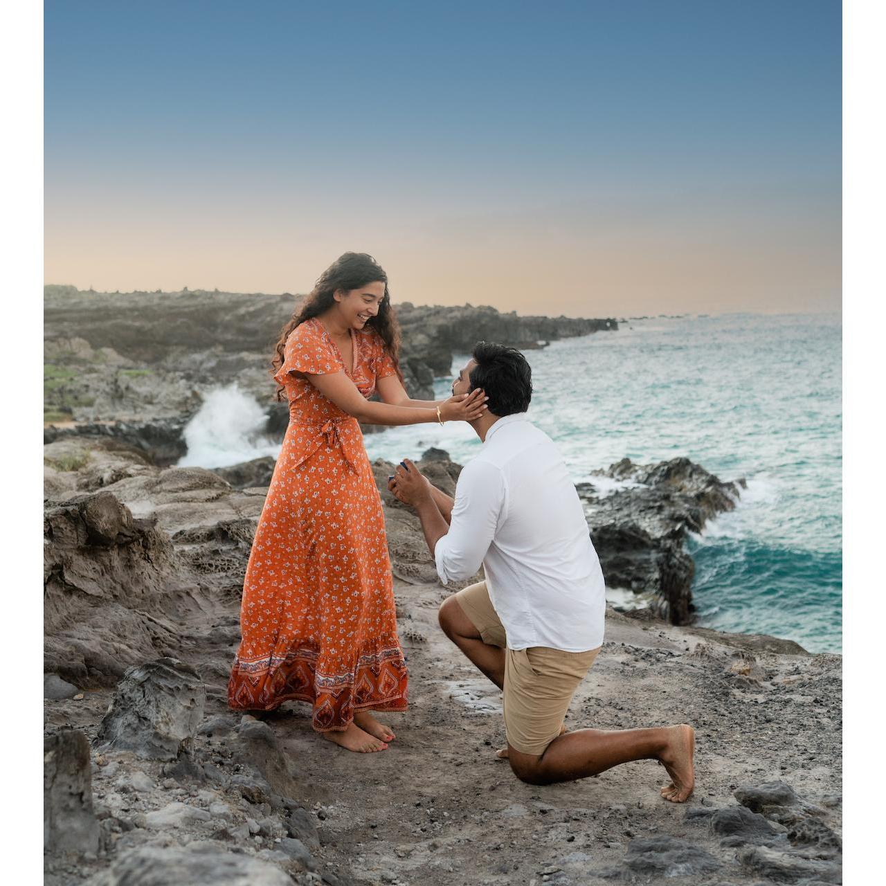 Ajesh proposed cliffside in Hawaii at sunset. It was pretty magical.