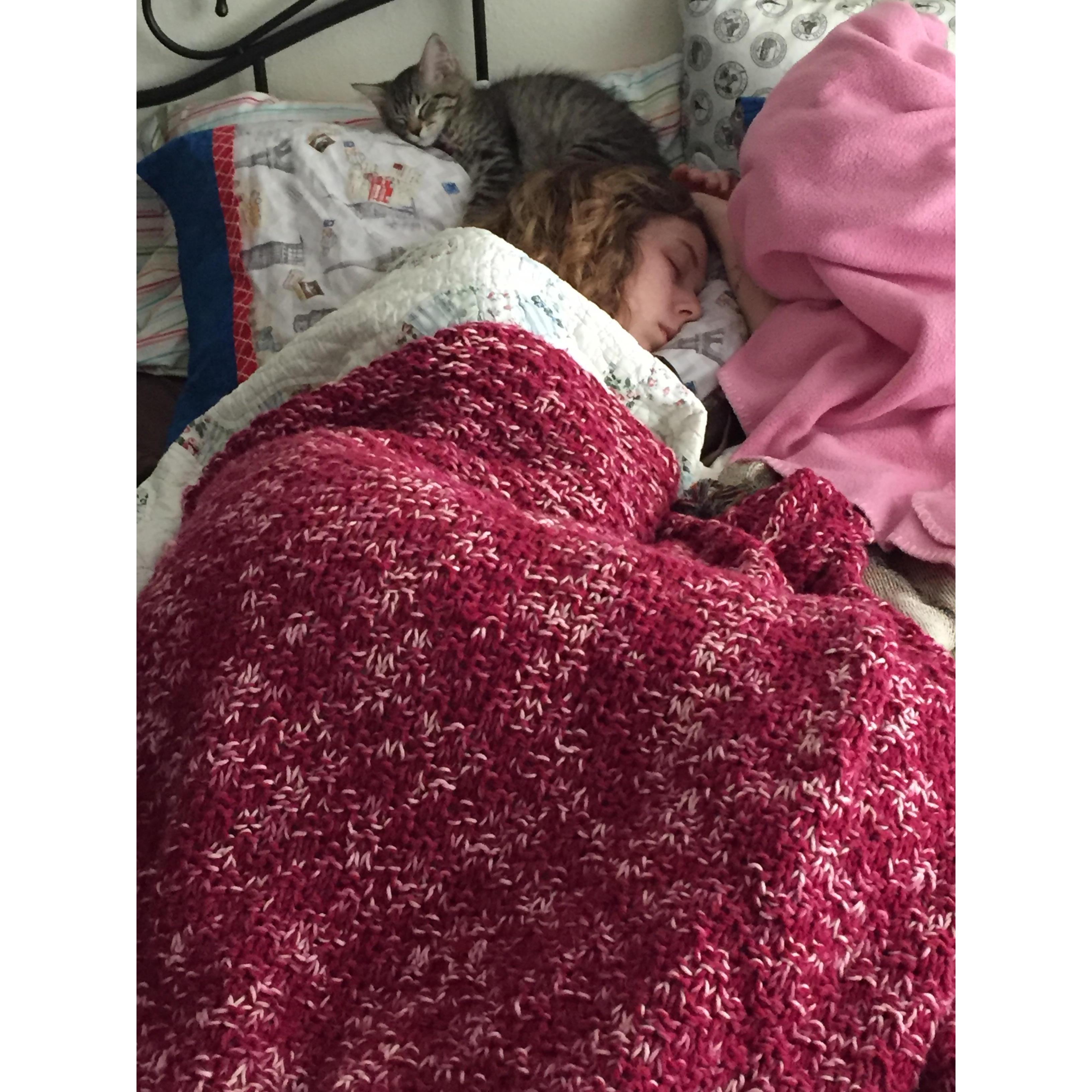 Sweet baby Roma trying to get comfy to sleep with Lindsey, her new mommy.