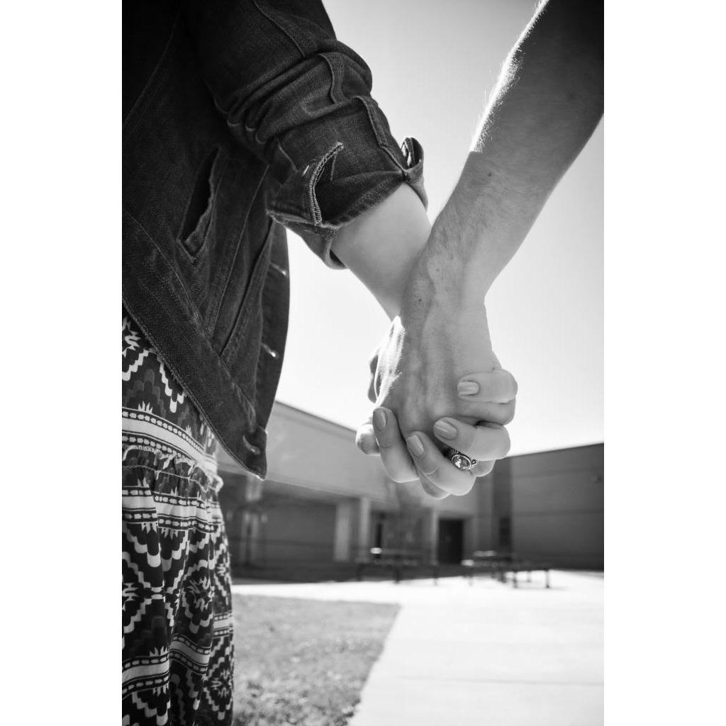 Photo we took our senior year of high school, that we then recreated for our engagement.