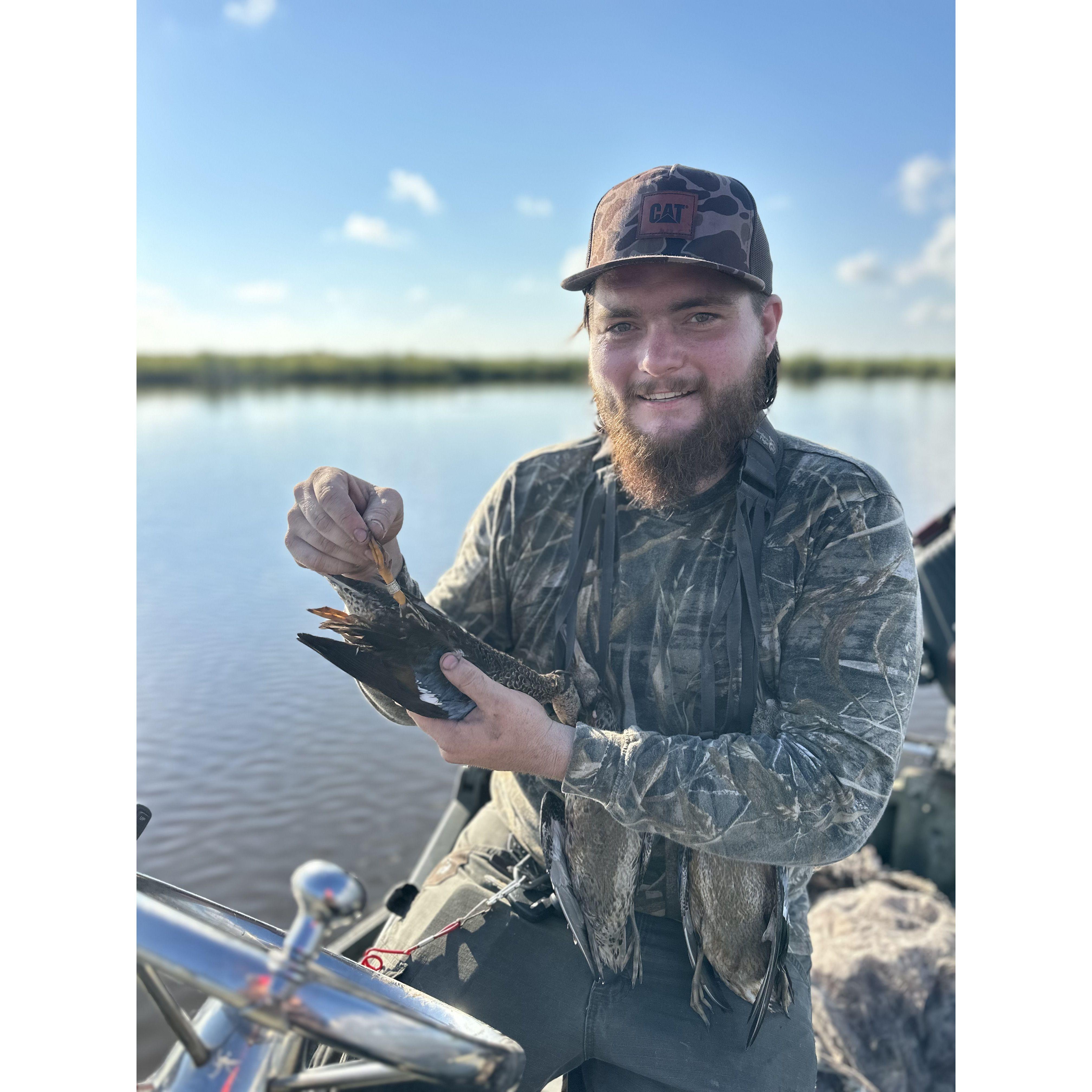 Reid's first banded bird! On a hunt with just the two of us. Memory of a lifetime!