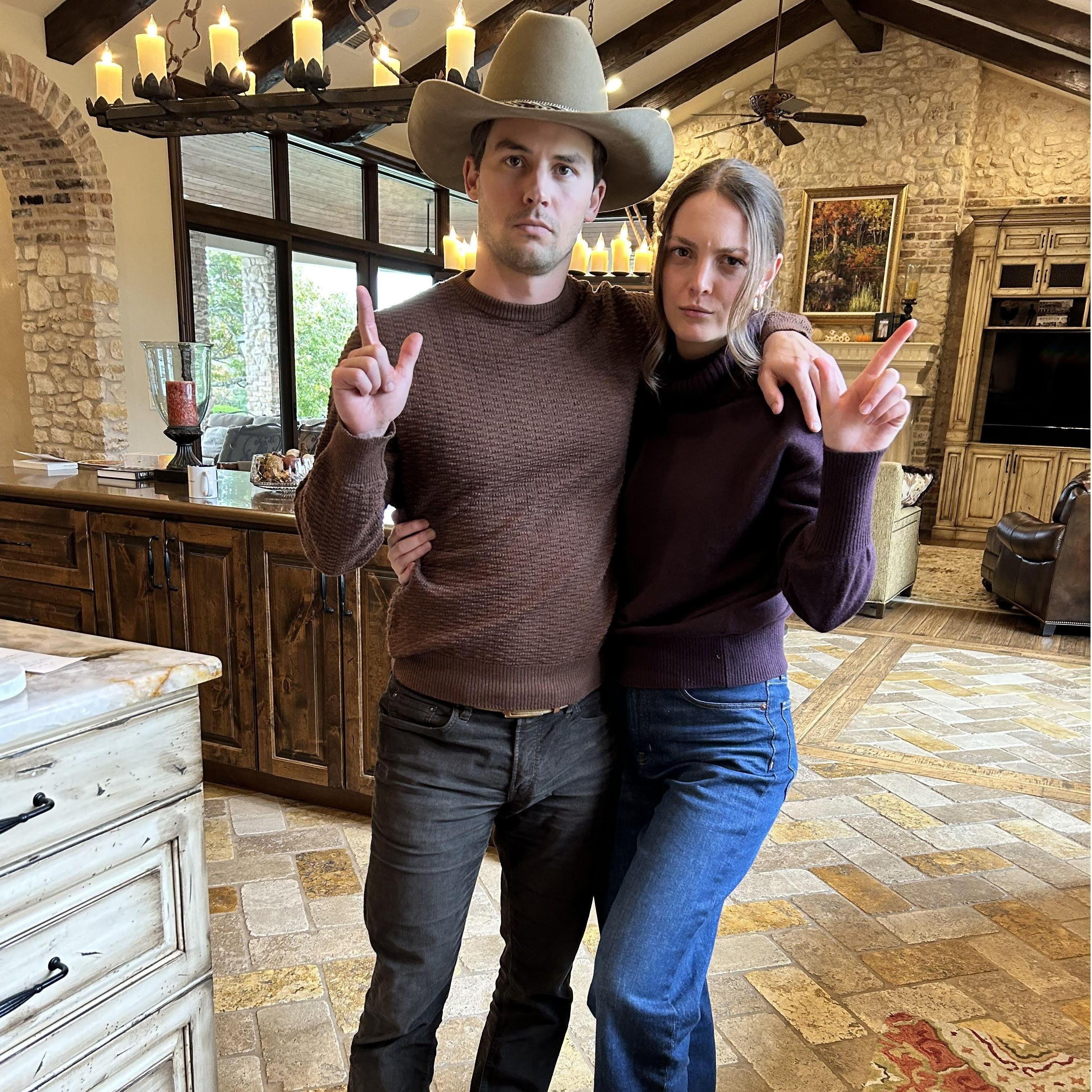 Embracing the cowboy lifestyle while visiting Austin's parents for dinner.