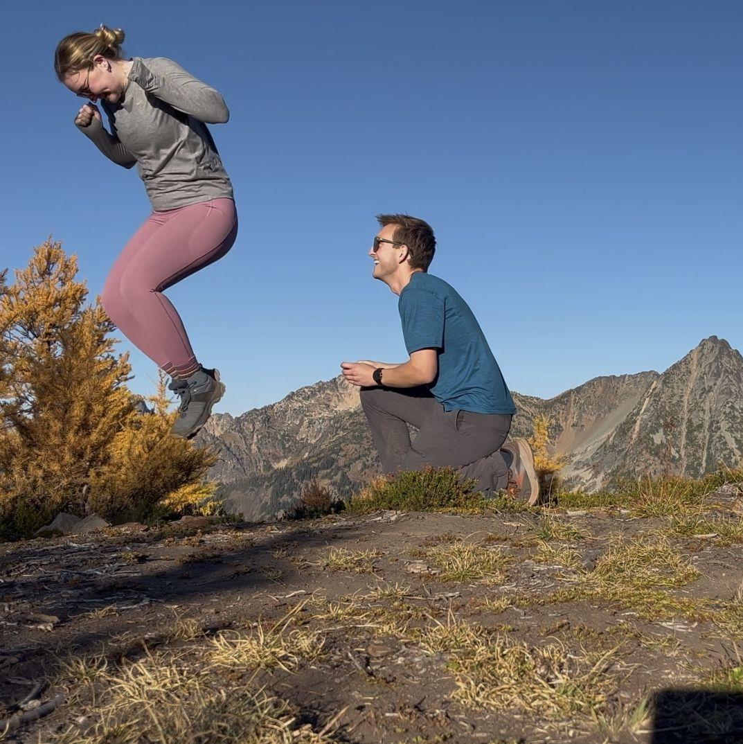 Tom proposed on October 12th, 2024, on a hike in North Cascades National Park with a backdrop of autumn-yellowed larches. It was, of course, an immediate "yes!"
