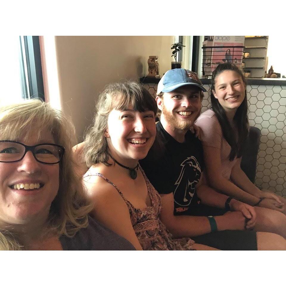 Family getting coffee.