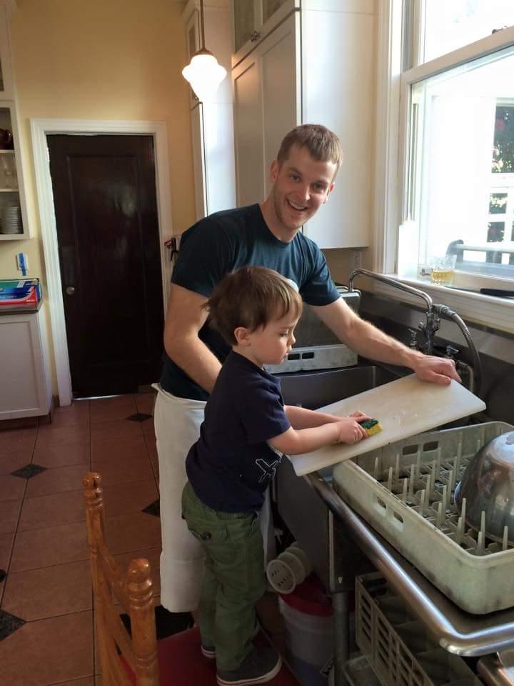 Jason teaching Elliot that sometimes you gotta do the dishes to make people happy.