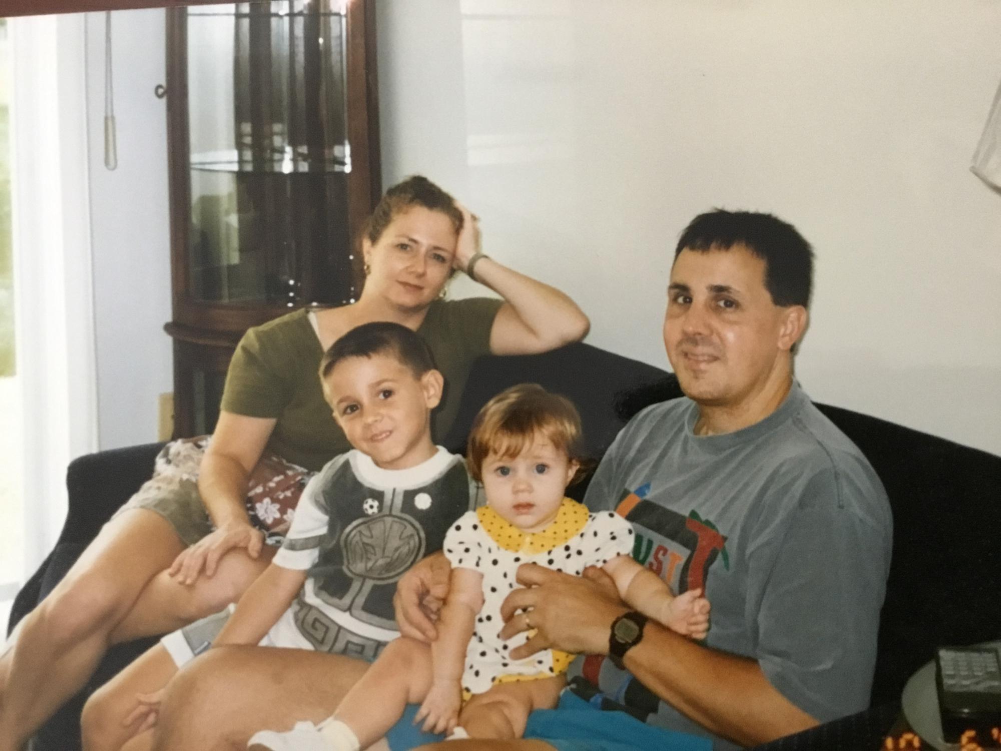 Michael with his mom, sister, and dad