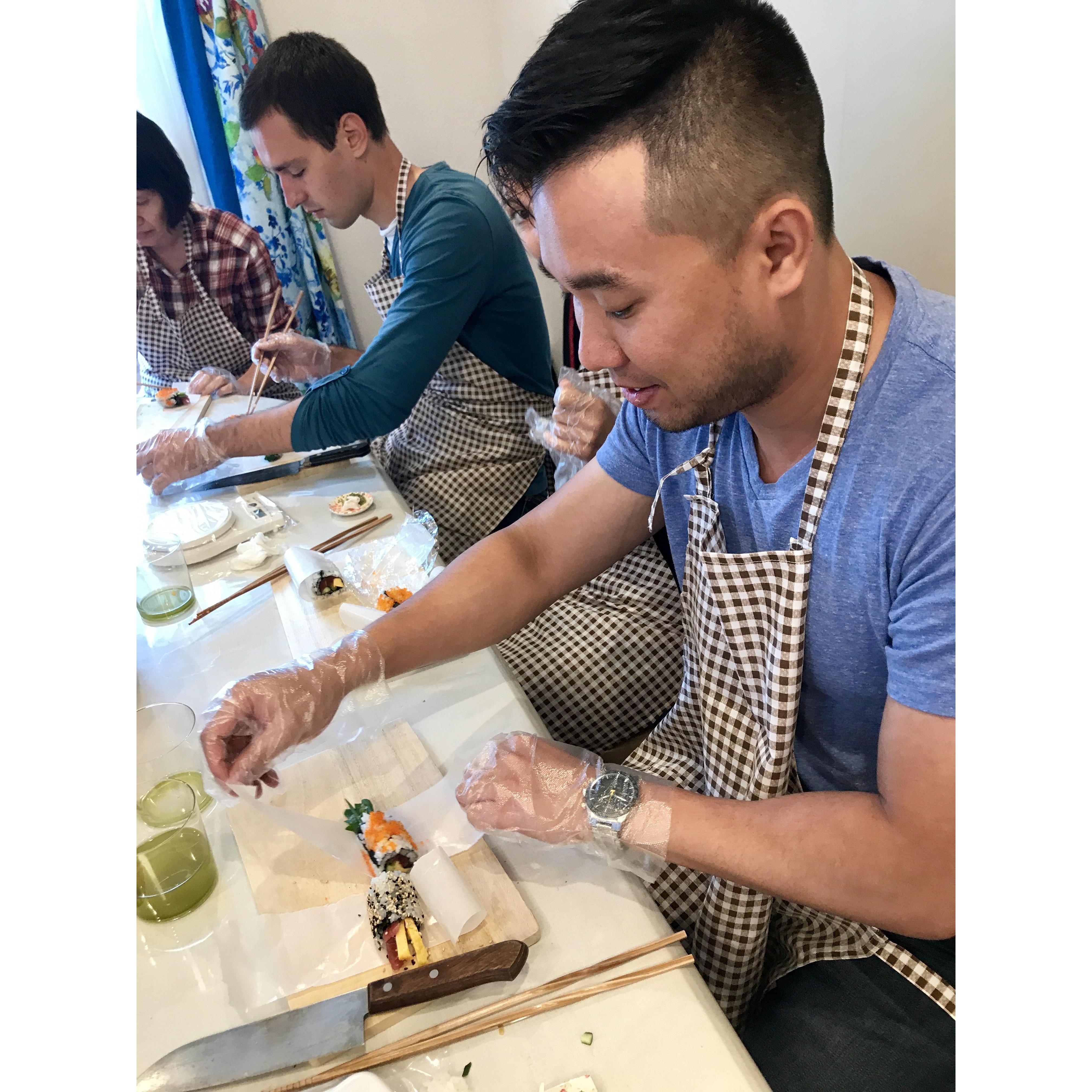 Martin learning how to make sushi in Tokyo, Japan, in the home of a famous TV chef and cooking chef.