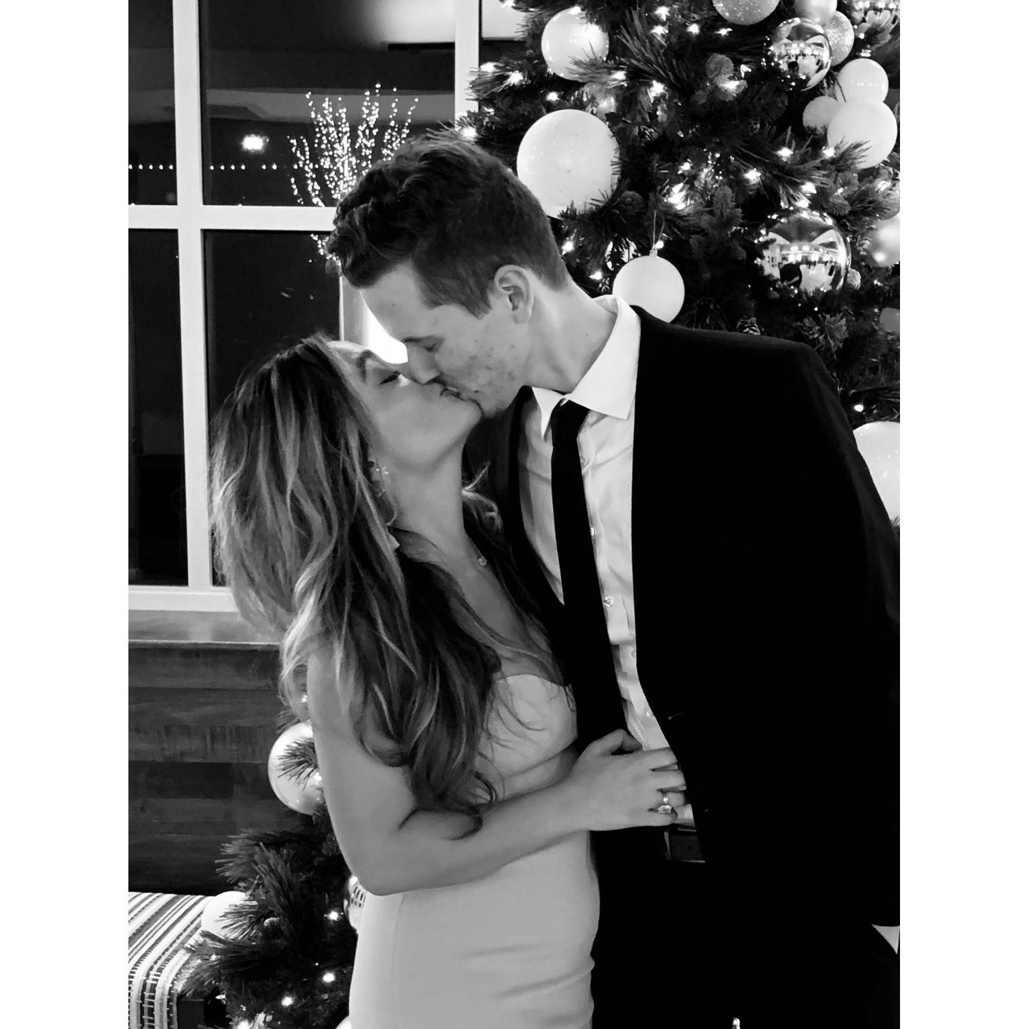 Taken from a friend's wedding reception. One of Lizette's favorite photos of us.
