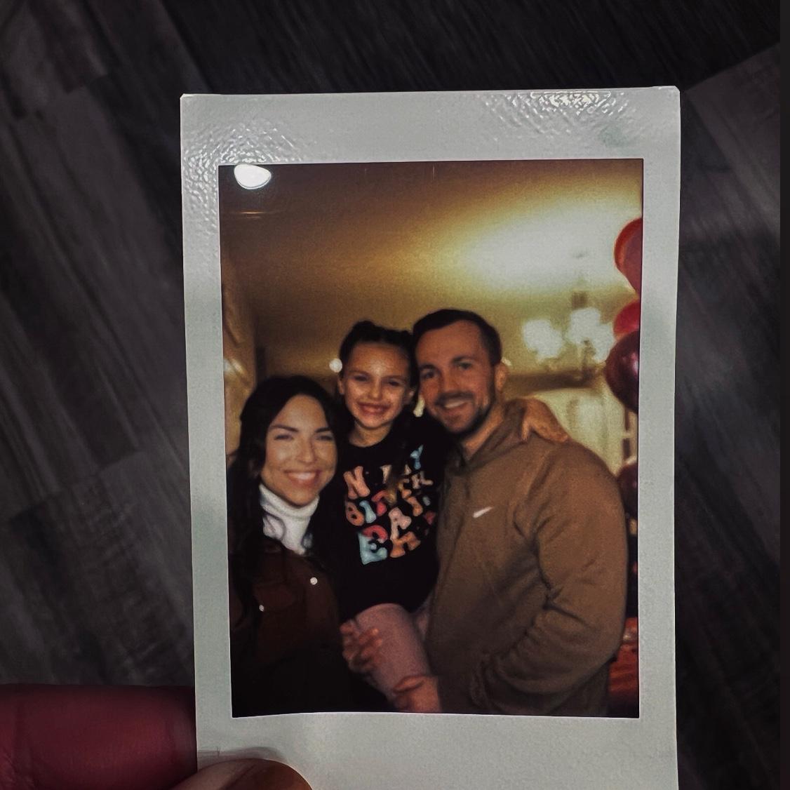 Blake’s niece was given a Polaroid camera - we have so many around our house that Emilia takes of us! Ha!