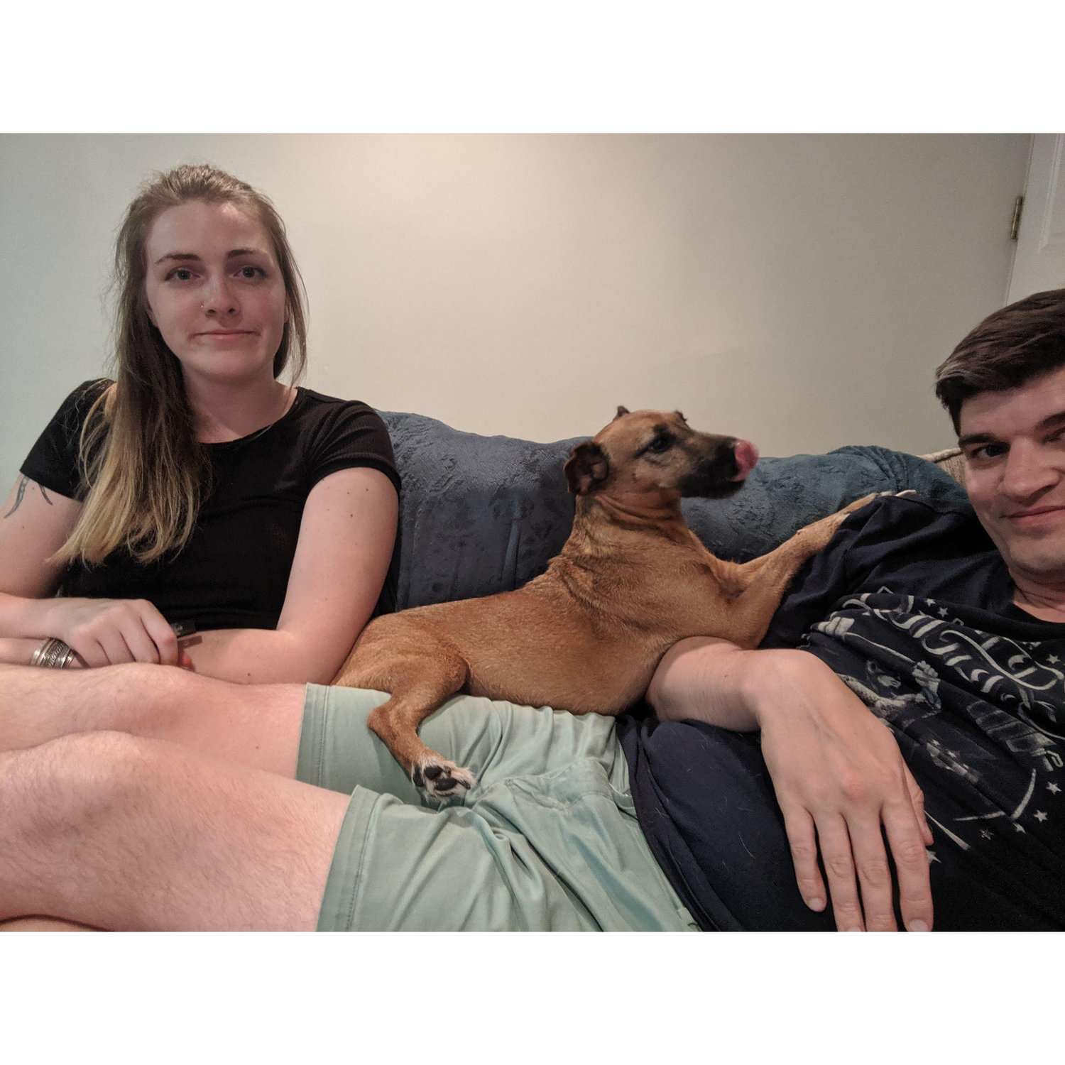 Our first (very small) couch together after Kayla moved to DC. (Don't ask what happened to our normal sized couch...)