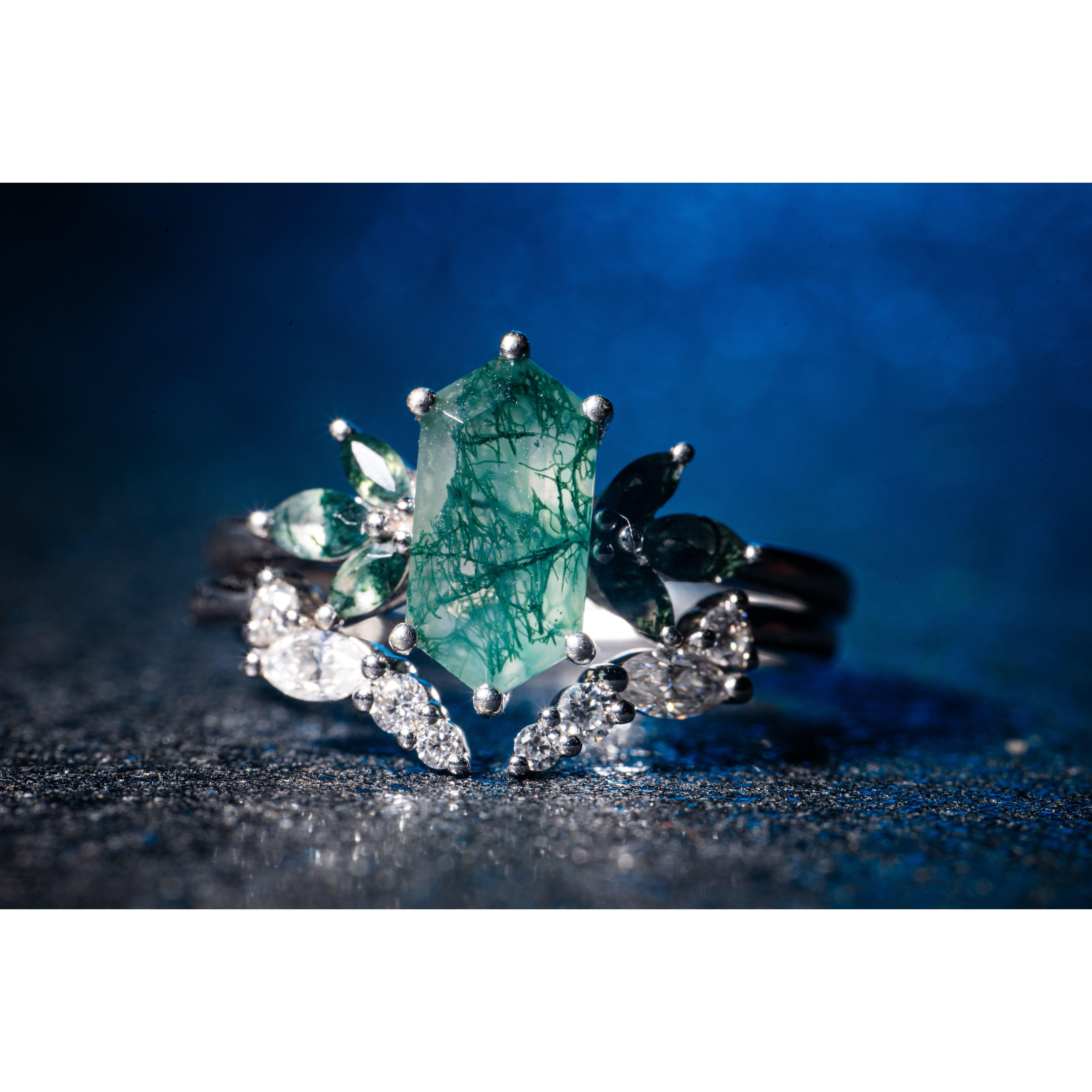 The beautiful ring, Micah hand picked the center stone and custom ordered the design