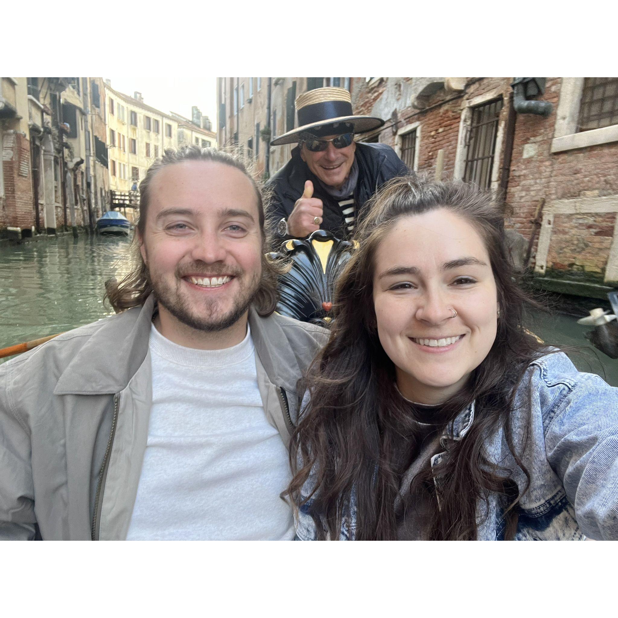 Taking a gondola ride around Venice