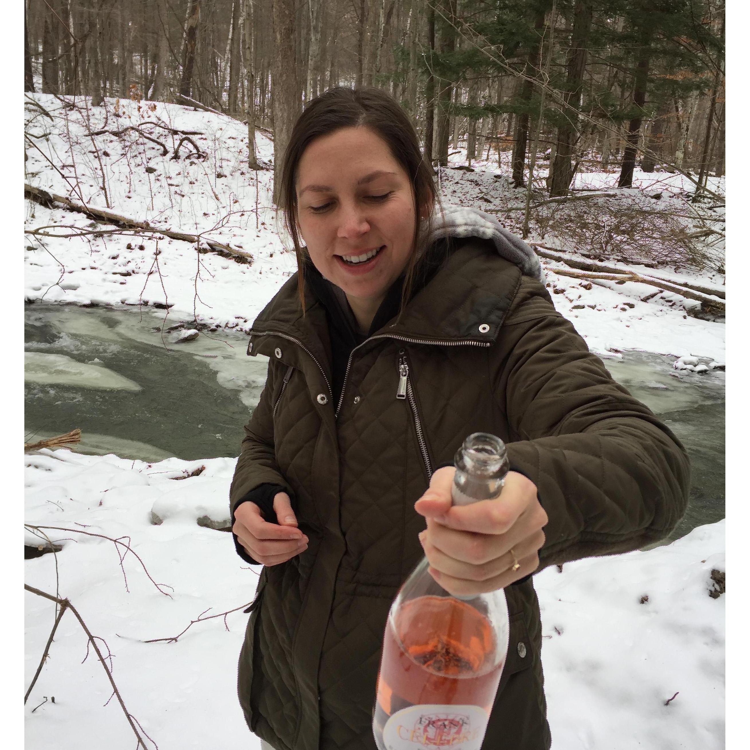 A bottle of sparkling in the woods - to celebrate our engagement on the spot.