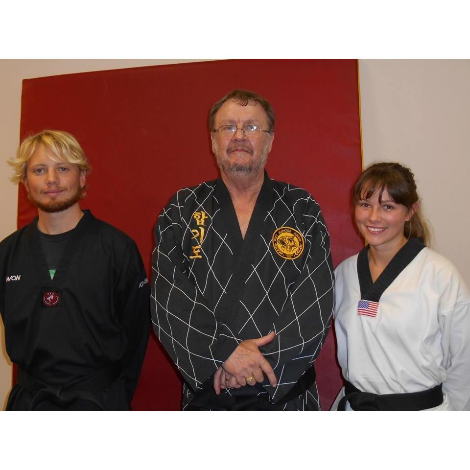 Our first Taekwondo seminar trip together in Wilmington, NC. We are pictured with Grand Master J. R. West.