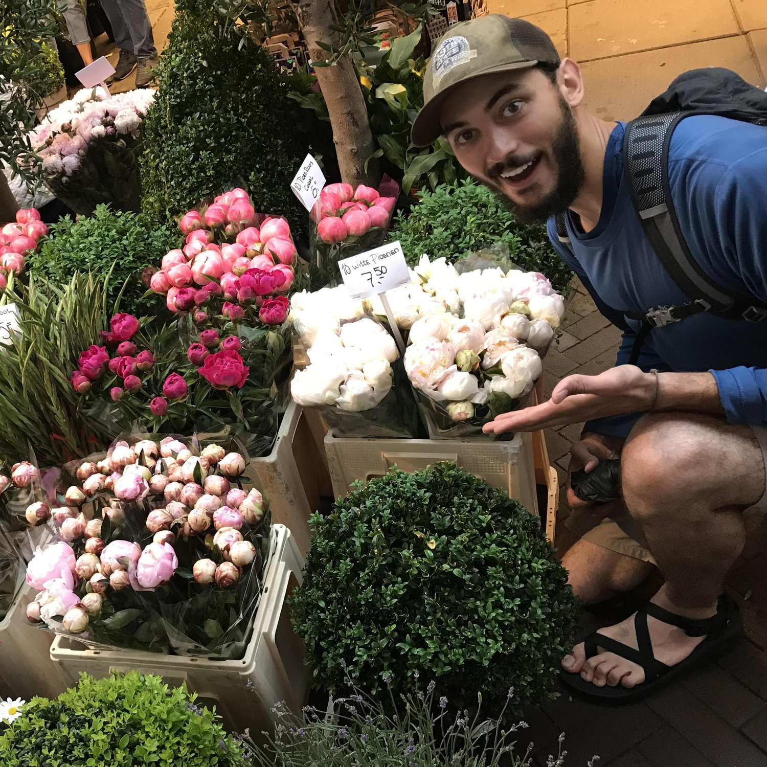 The Peony Farmer appreciating peonies in Amsterdam