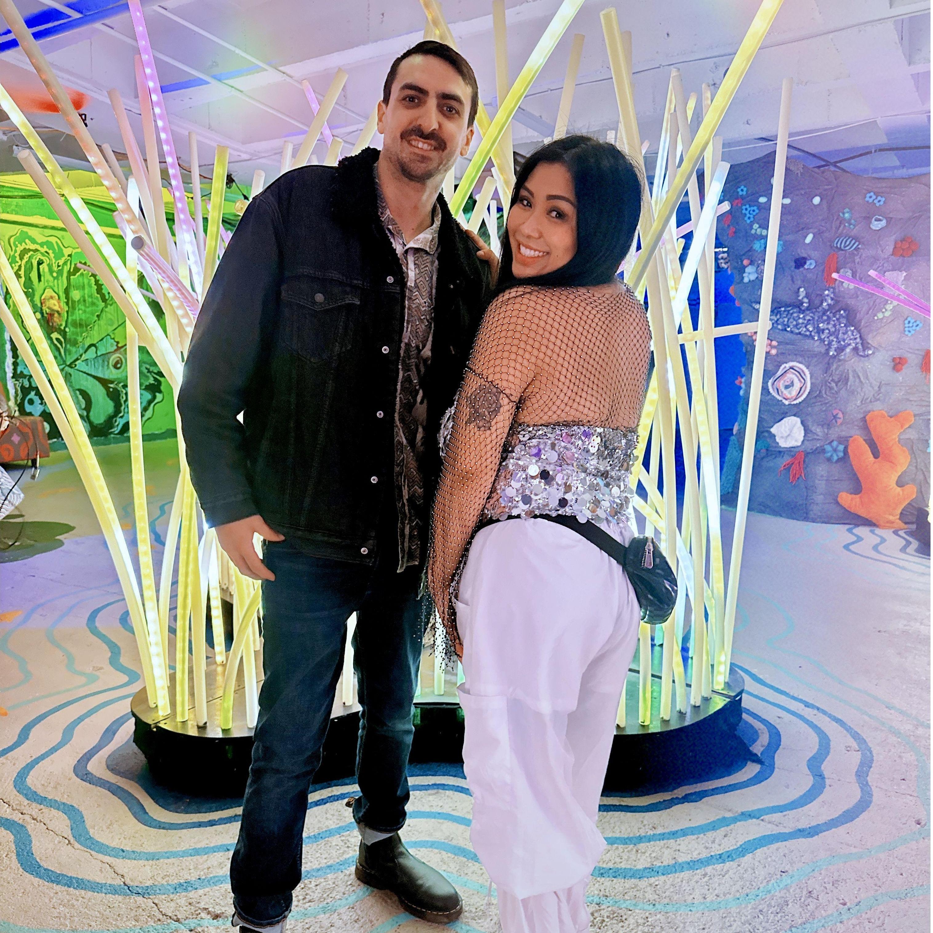Kolby & Sara at at an immersive art gallery for a friends birthday. The couple loves to dress up, and explore the city, especially new places!