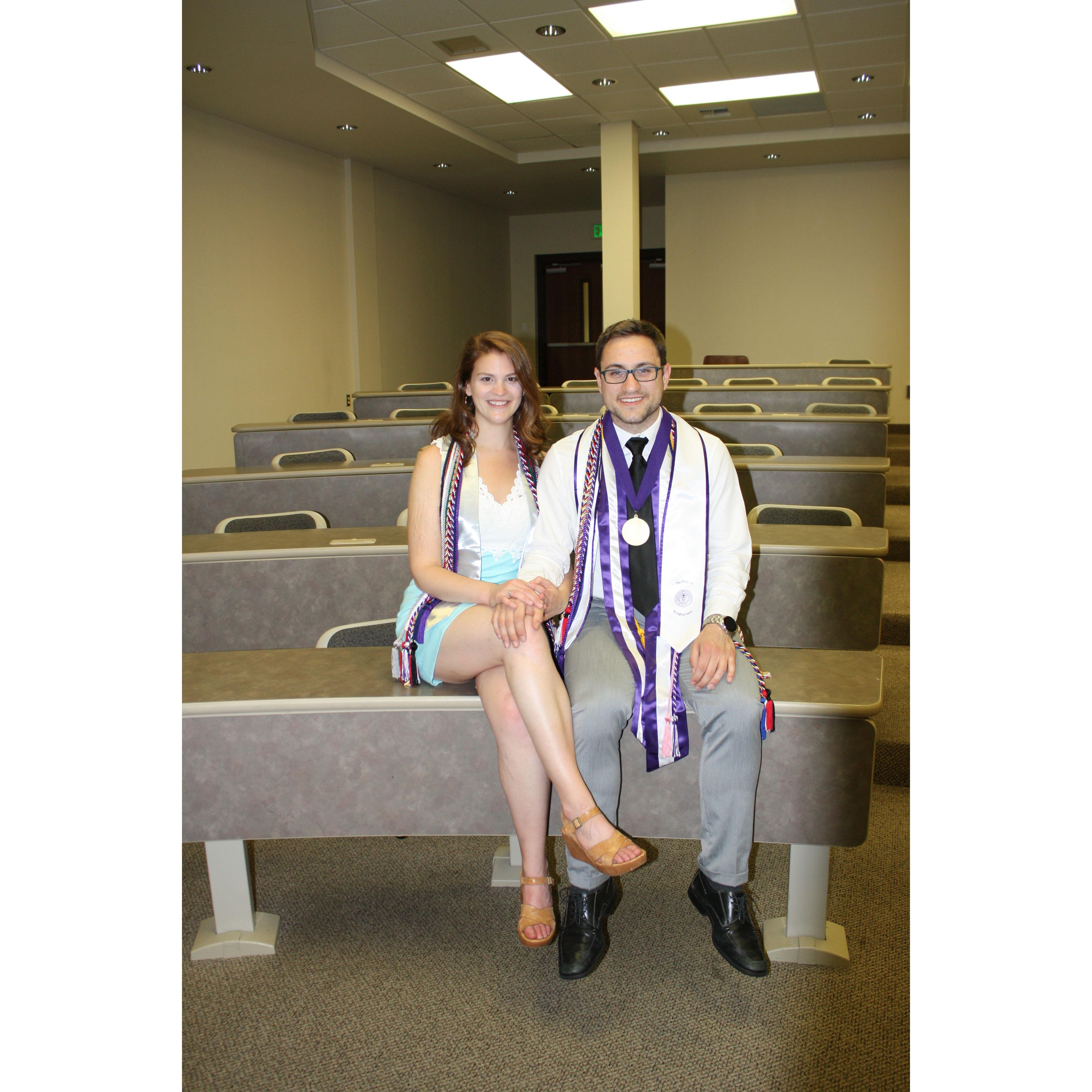 We met at High Point University. We graduated together in 2018. This photo was taken in the classroom where we had our first class together.
