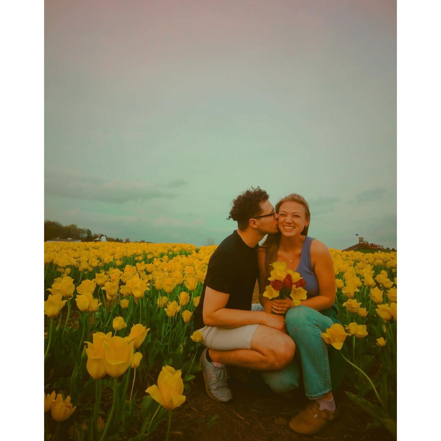 Tulip picking with Chris's siblings Eric, Leyda, and Kevin in April 2024!