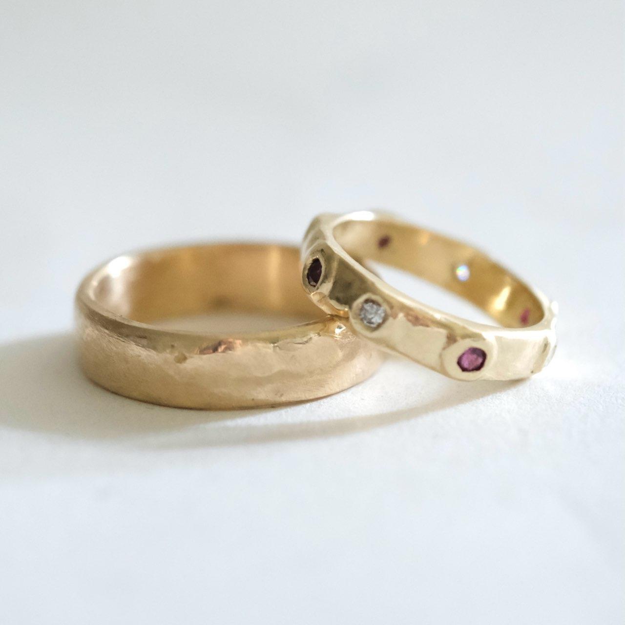 Our wedding bands are very special to us because my cousin Kate Furman made them. The rubies and diamonds in my wedding band came from a piece of my grandmother's jewelry.