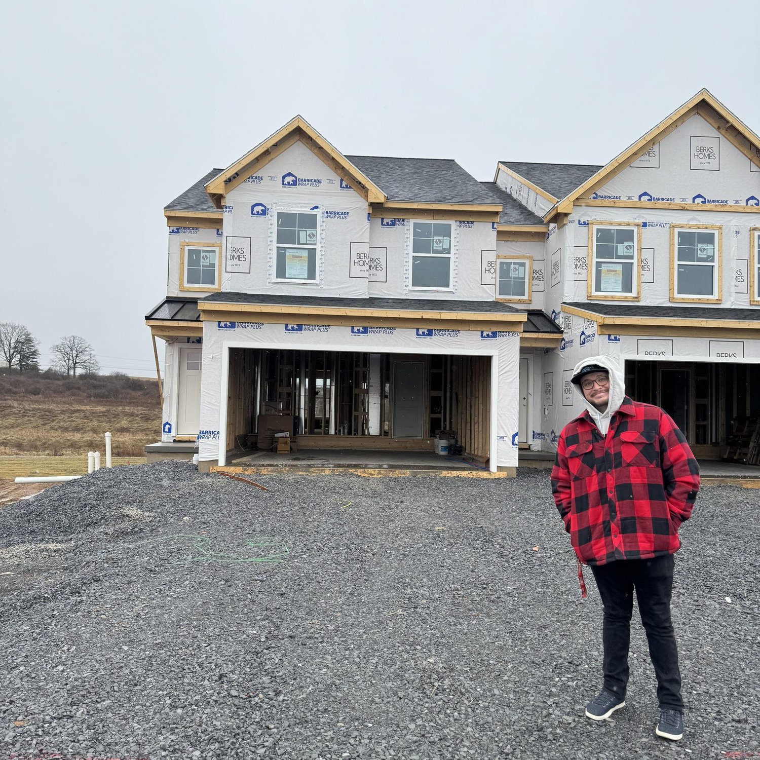 Tyler showing me his biggest investment yet - where we would soon make our first home together!