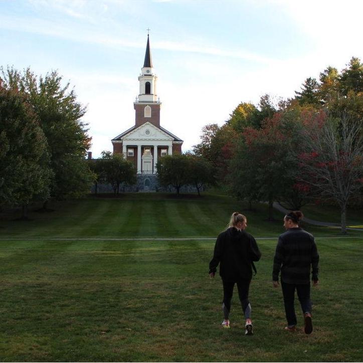Walking on Colby's campus in front of the chapel