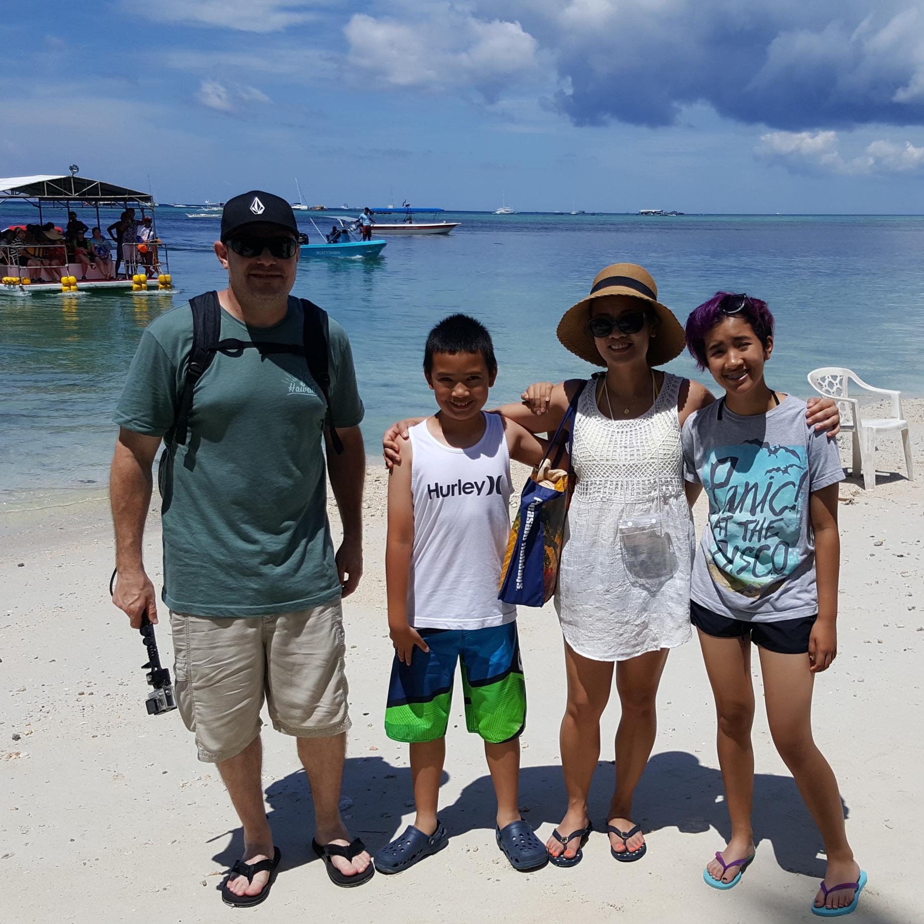 Going to ride the local "banka" to visit another island for a cliff diving adventure at Ariels Point.