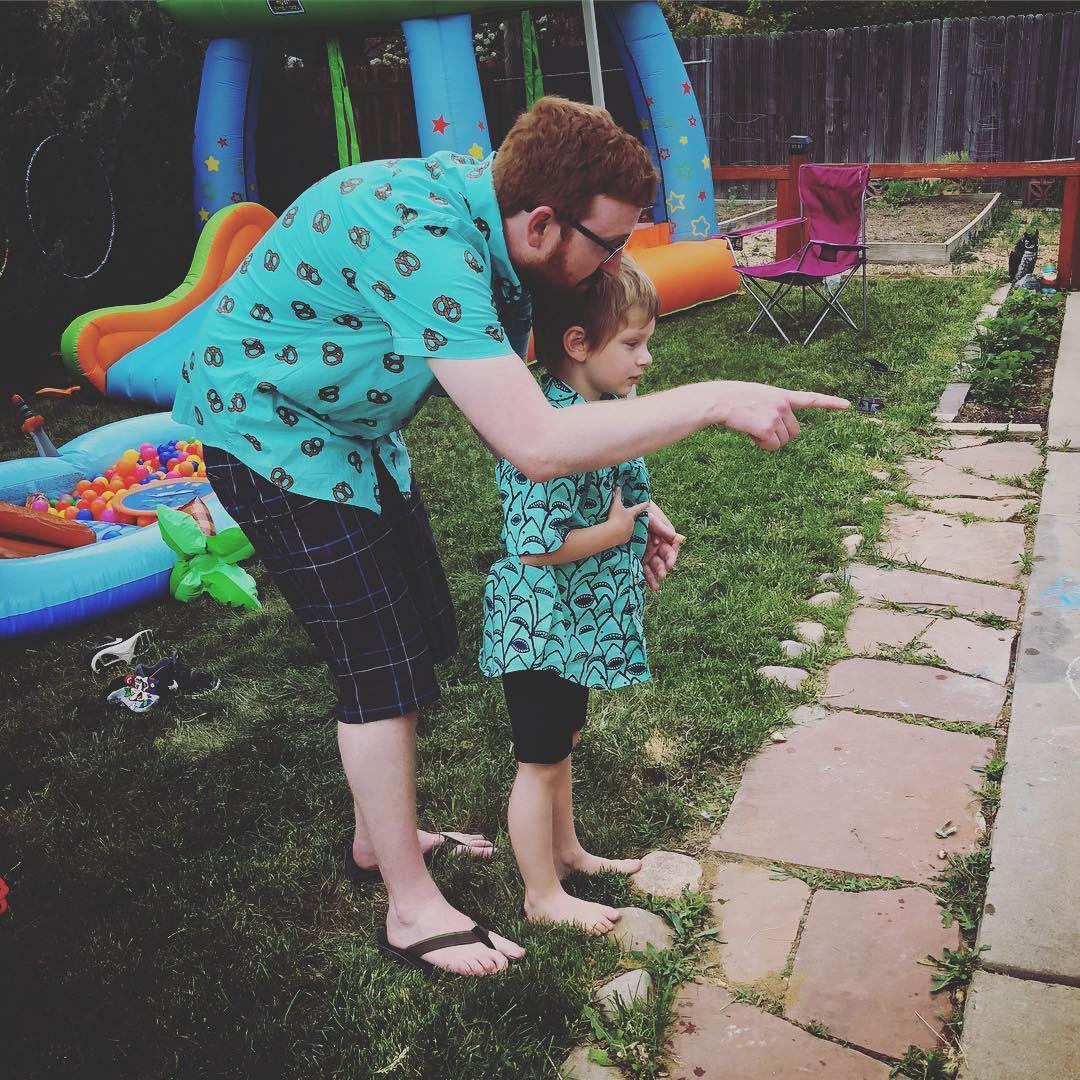 Connor had to have a matching shirt for Dylan's 5th birthday party. Such a good Daddy!