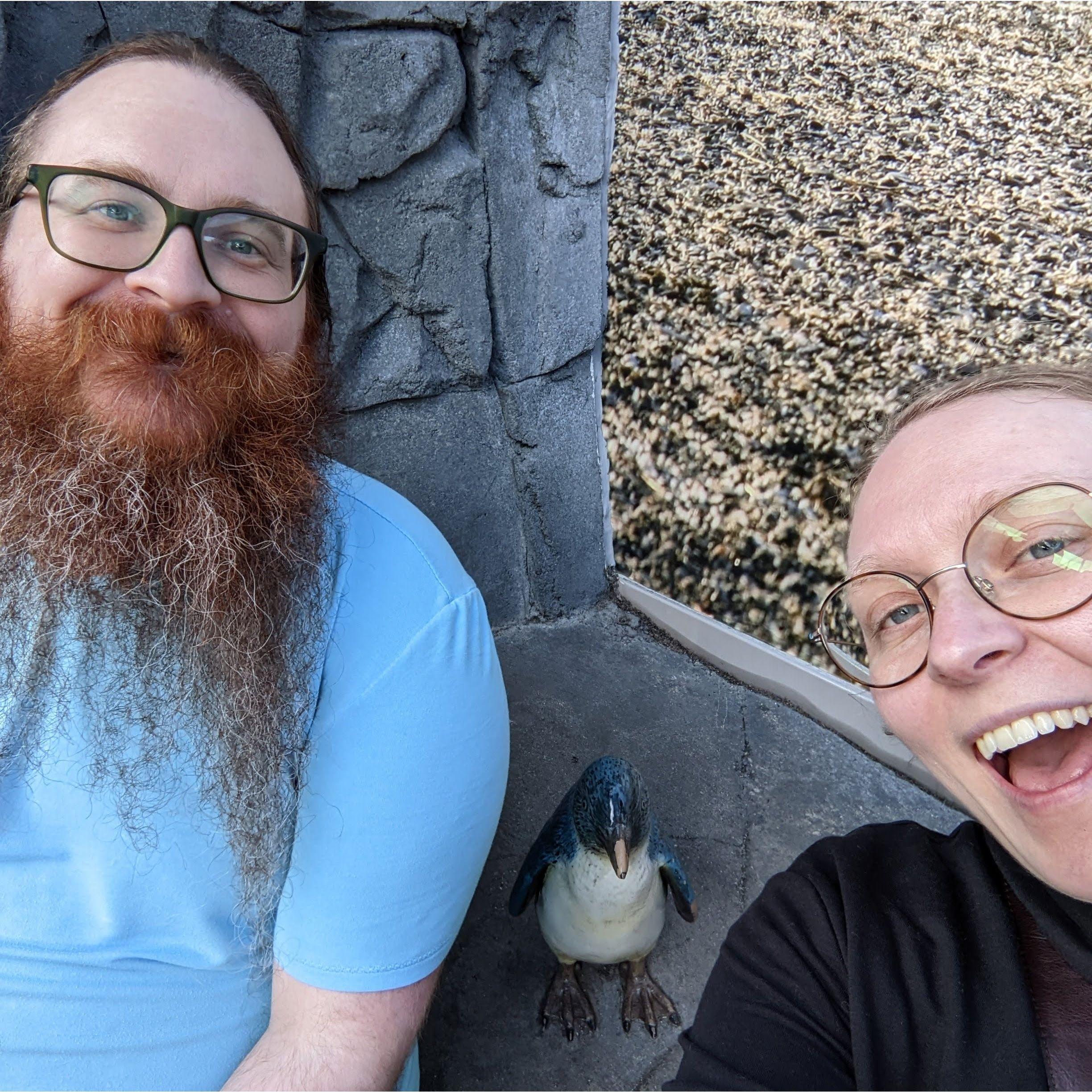 Us being too excited about this penguin statue.