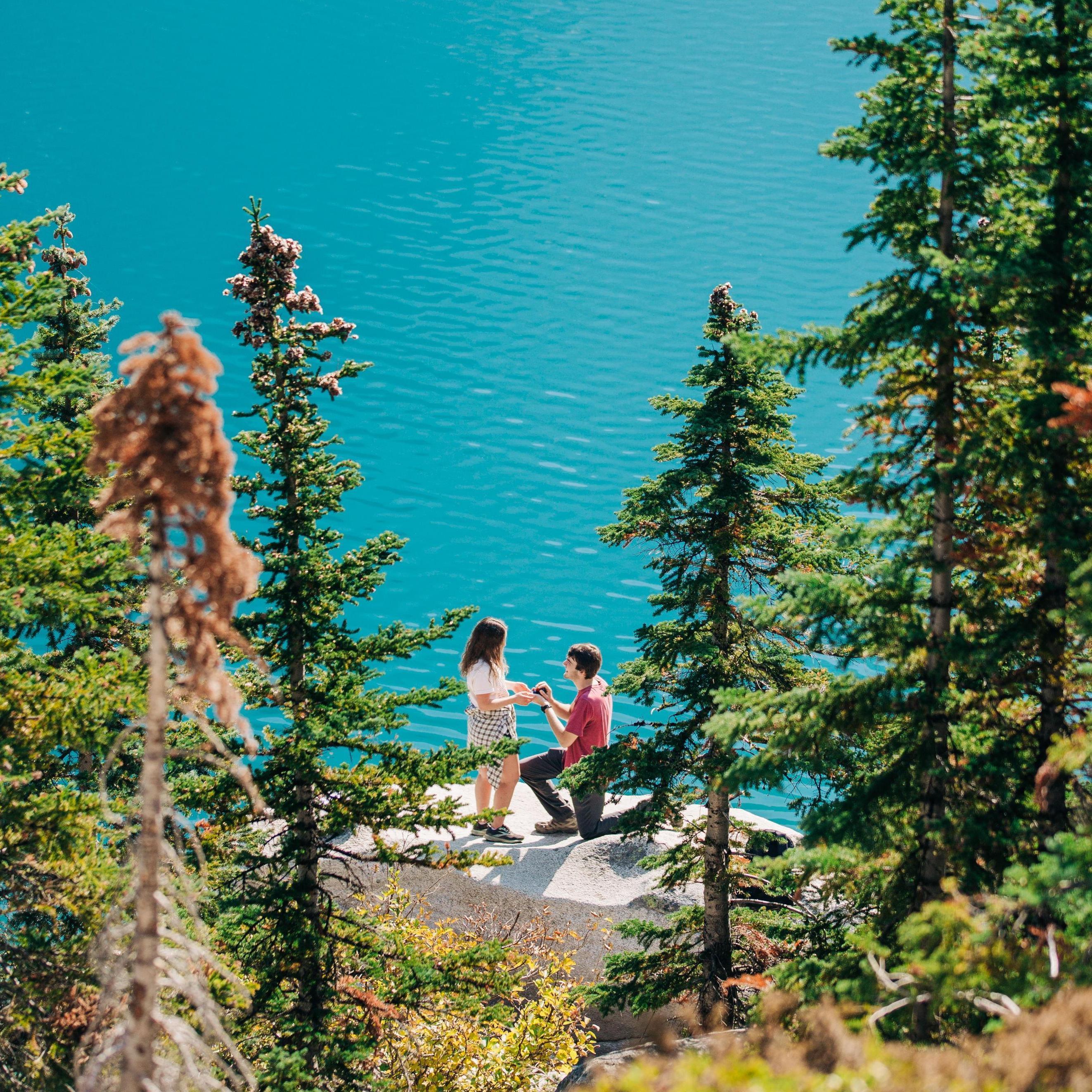 Karsten proposes to Sophie at Colchuck Lake in Washington State. Photo credit: Rachel Walker Photography. www.rachelwalkerphotography.com