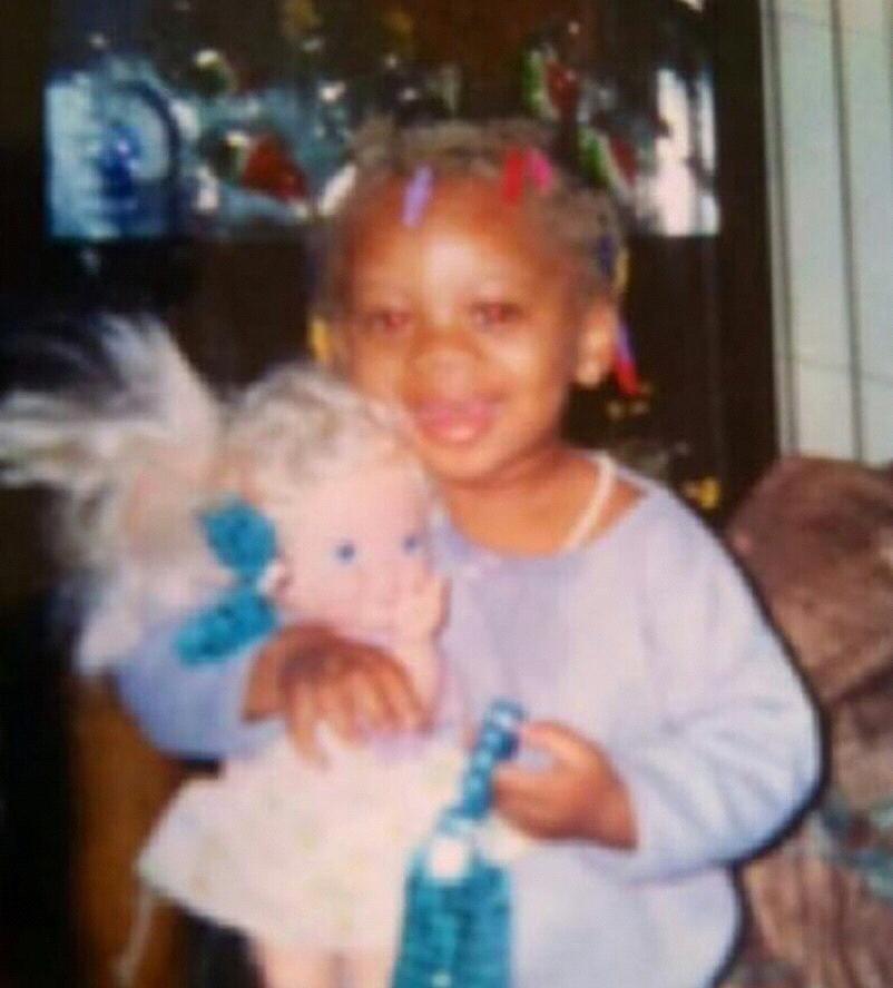 Kyla with one of her favorite dolls