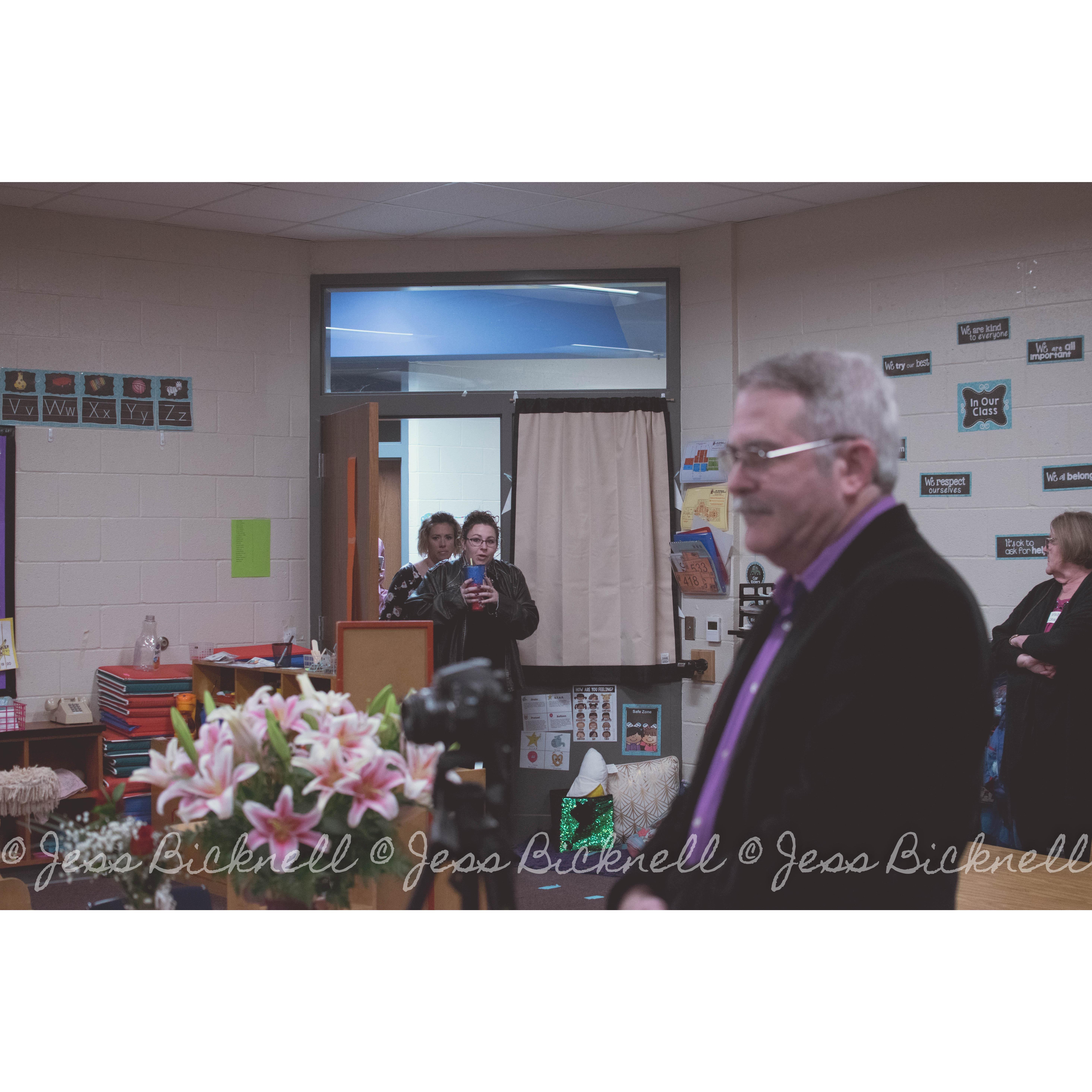 The look on her face as she entered the door was priceless, she knew there were a few things off that day, but she never in a million years thought he would propose at the school where she worked.