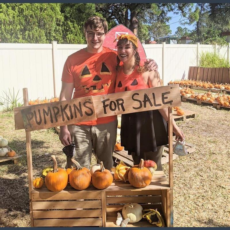 A pair of pumpkins in the patch