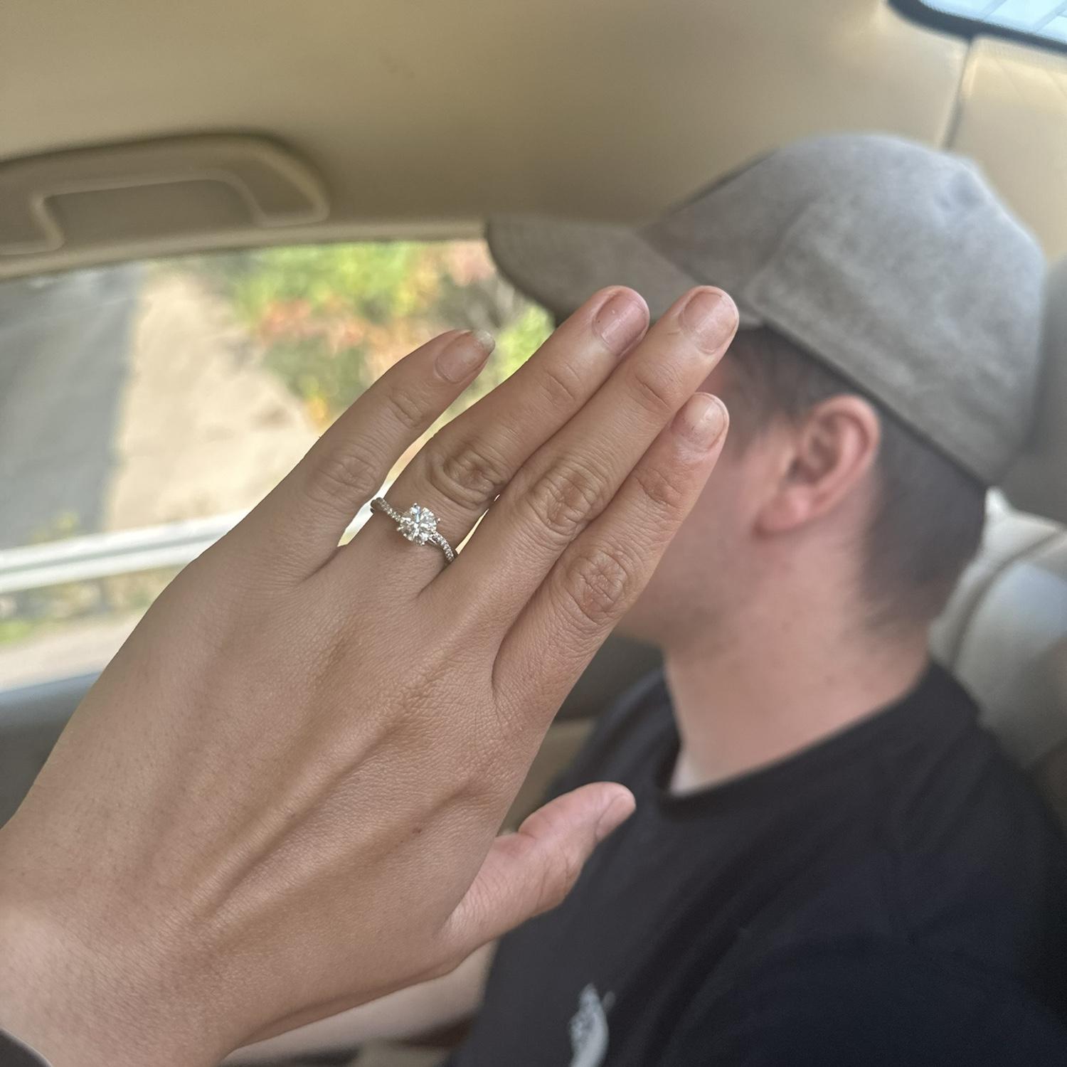 Jake was carried the ring, on one knee, asked the question, paddled the canoe.
Maggie was a passenger.