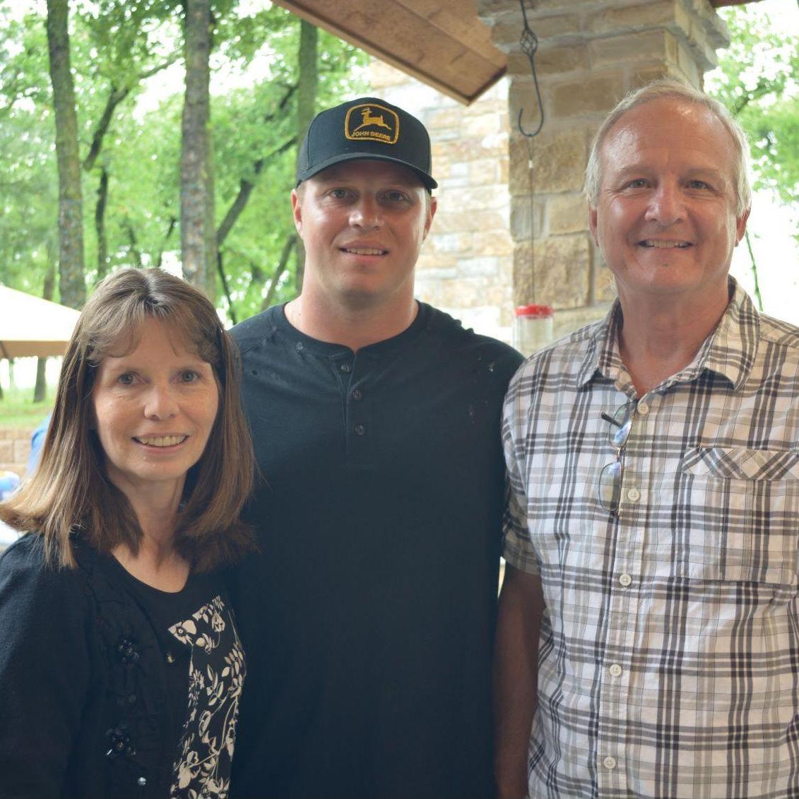 Cassidy and his parents. Janette and Brian.
