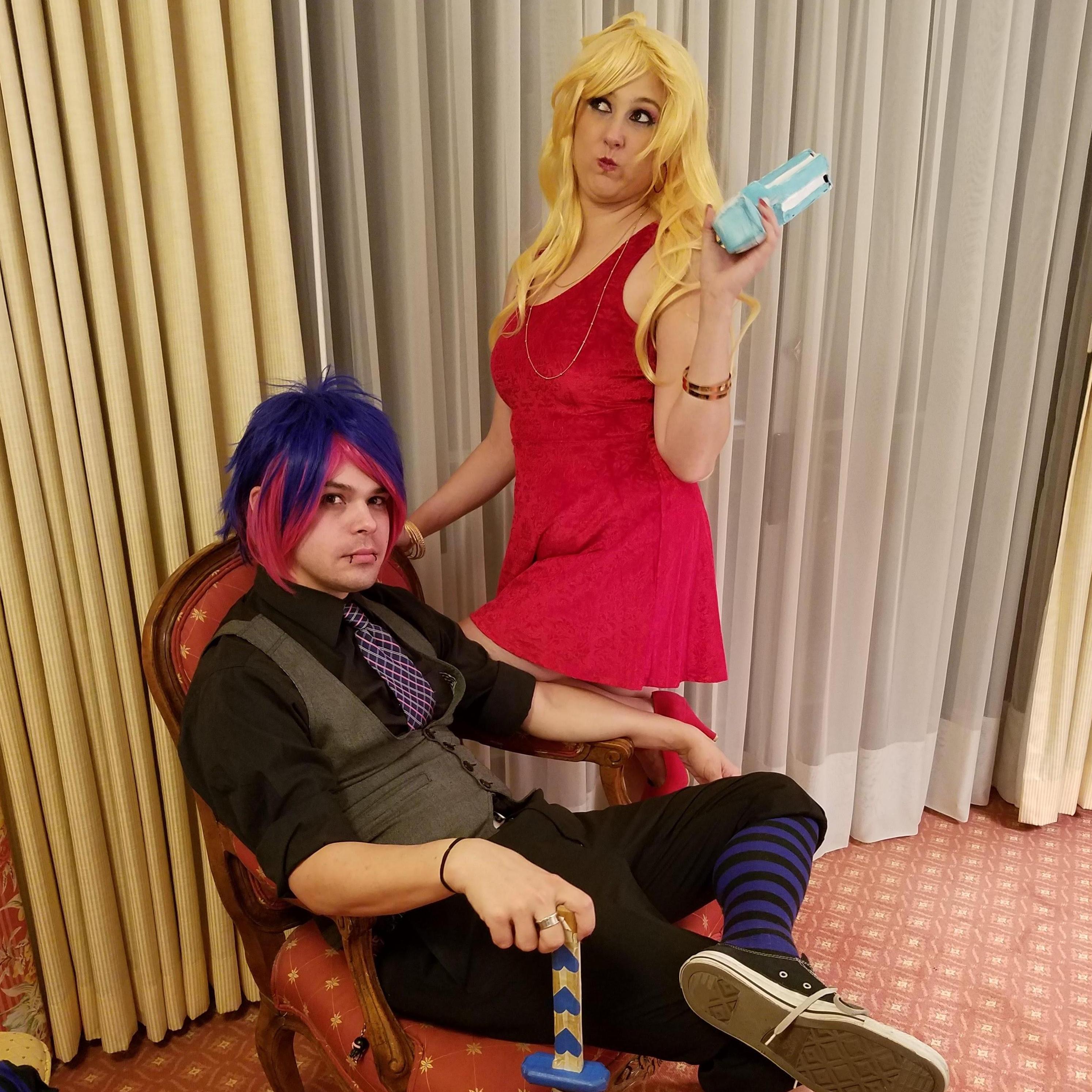 Our first convention. We cosplayed as gender-bent Stocking and Panty.