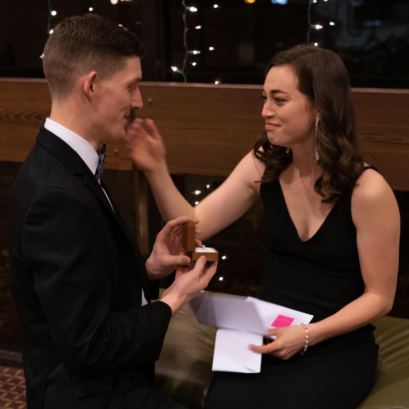 Here's the BIG moment! Anthony wrote Mary Beth a sweet letter. When she finished reading it, she looked up to find her love on one knee.
