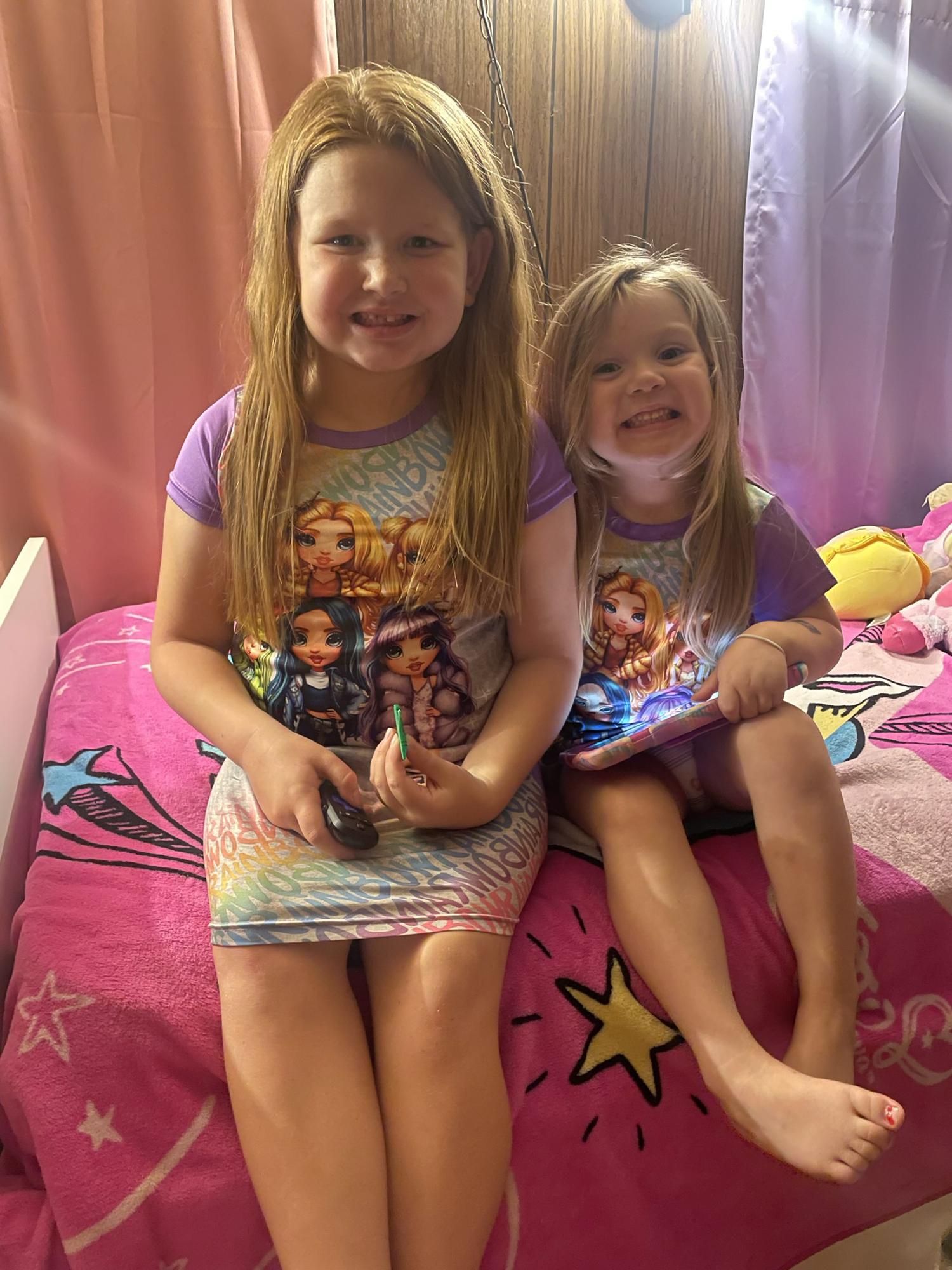 Matching pajamas make these girls so happy!