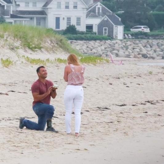 After a rainy motorcycle ride to Chatham, Ronnie said "there is a rock in my sock," and proposed!