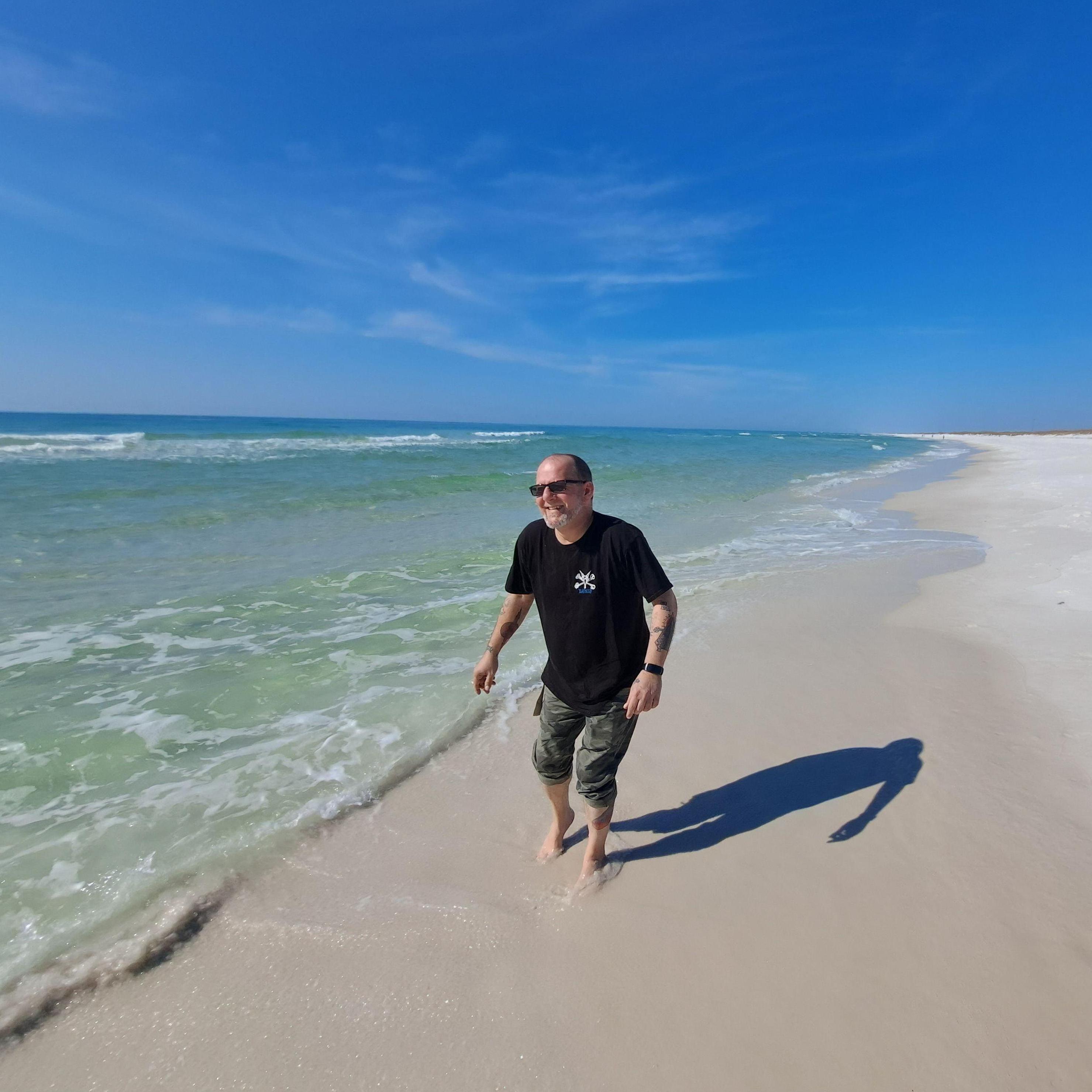 Our first Florida trip in Feb 2023. Gary embraces the chilly Gulf waters.