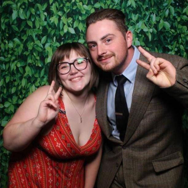 Posing for the photo booth at our friend Natalie's wedding.