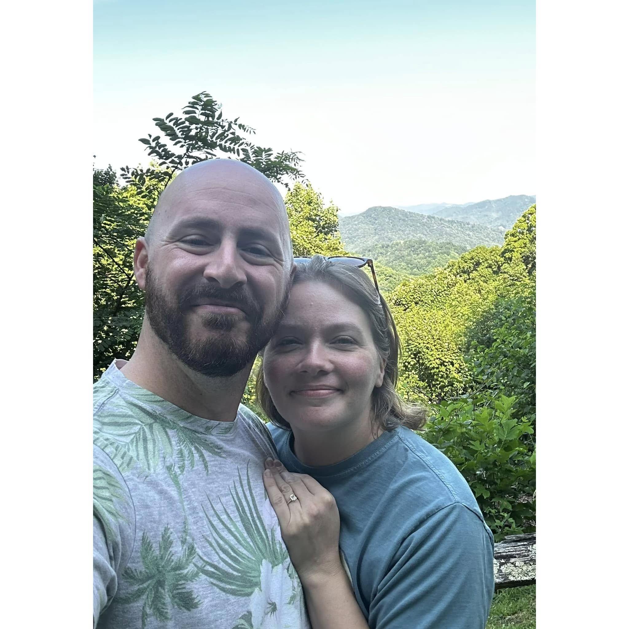 Greg proposed to Erin in the mountains of North Carolina surrounded by close friends <3