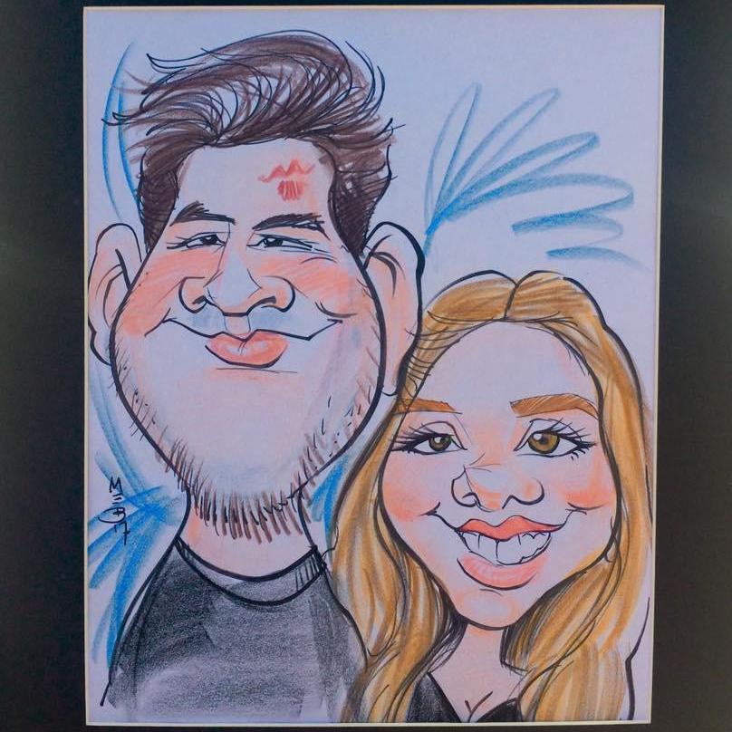 Our caricature that we got from Woodland Park Zoo after we were dating for a couple of months. The artist doing it said she felt like Tim & I had been dating for forever. Our chemistry was undeniable!