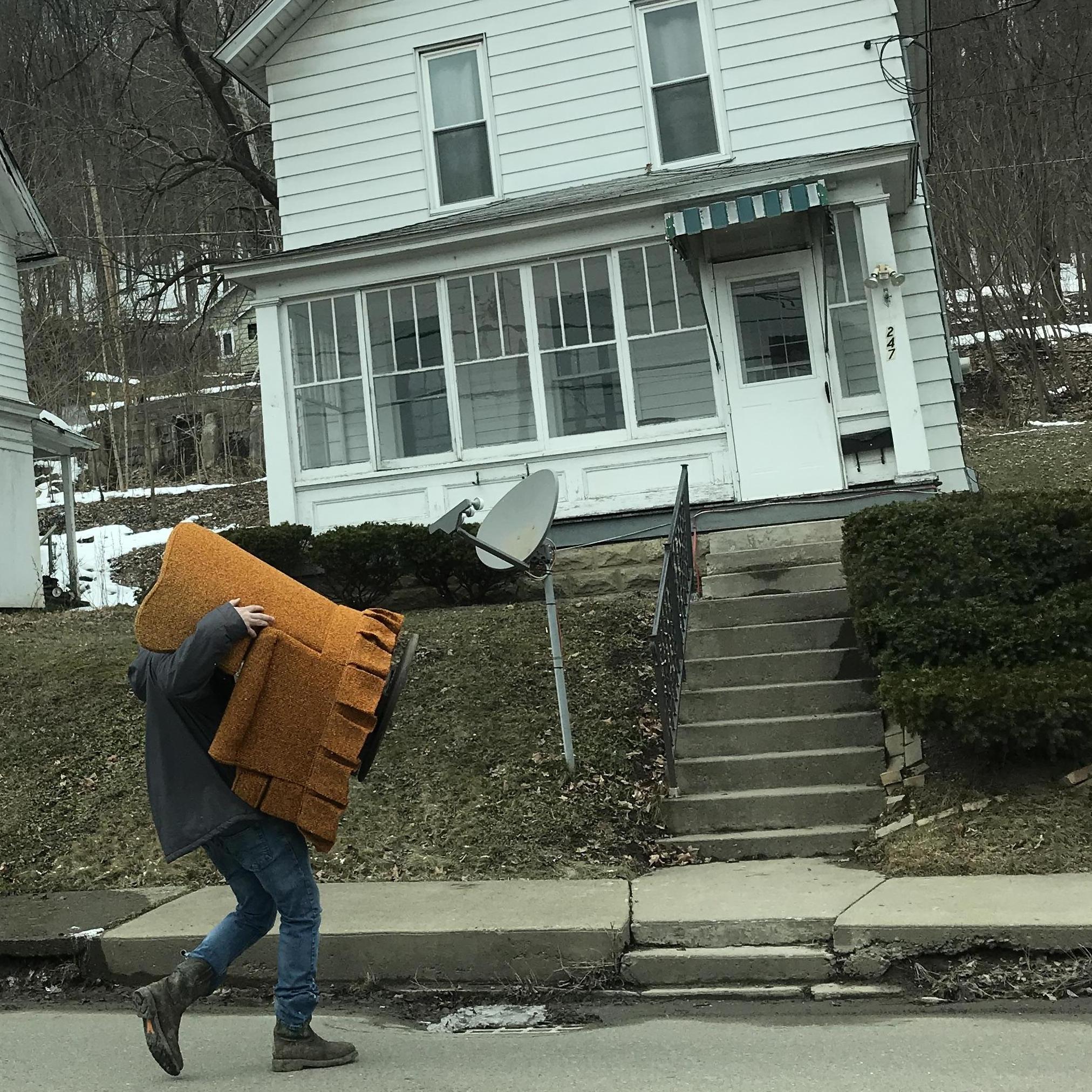 Moving into our first home together, and carrying a free chair I found off of Facebook with no complaints