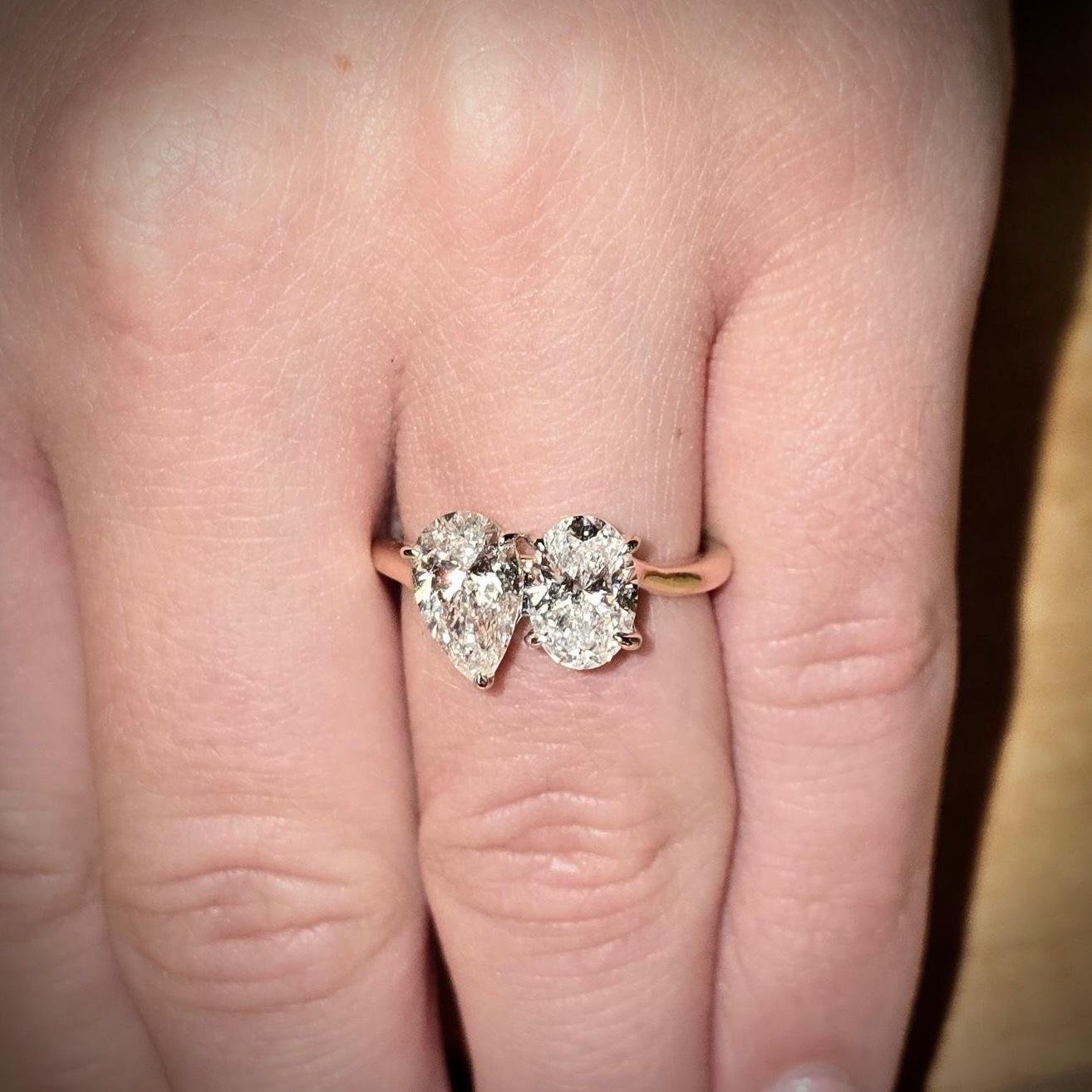 The ring. It’s called a Toi et Moi, meaning you and me. Underneath the prongs interlace providing support for each other.