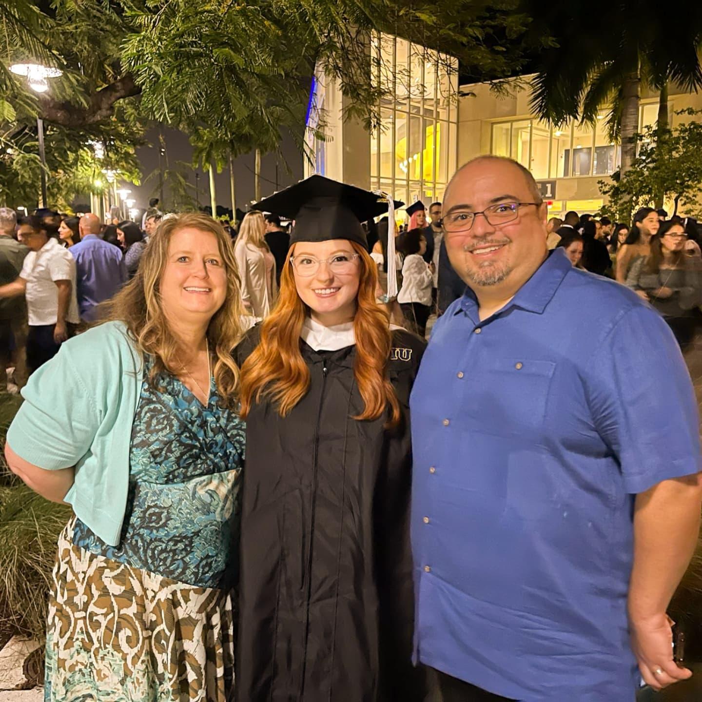 Bethany and her parents after attending the graduation for her masters