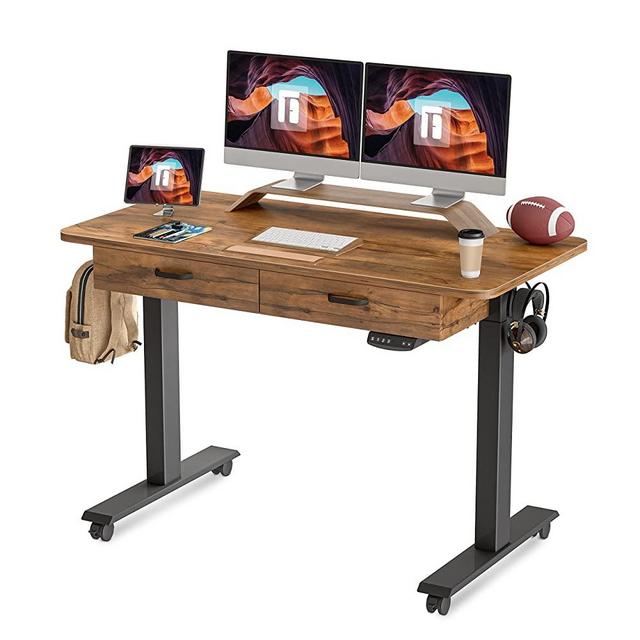 FEZIBO Adjustable Height Electric Standing Desk with Double Drawer, 55x 24 Inches Stand Up Home Office Desk with Splice Tabletop, Black Frame/Fir Brown Top