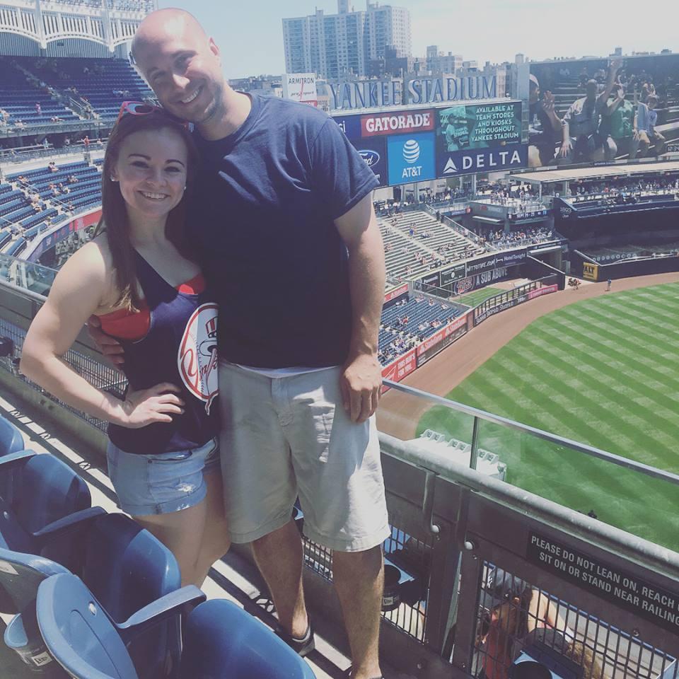 Yes, Casey is at a Yankee game! (And has been to several since we've been together)